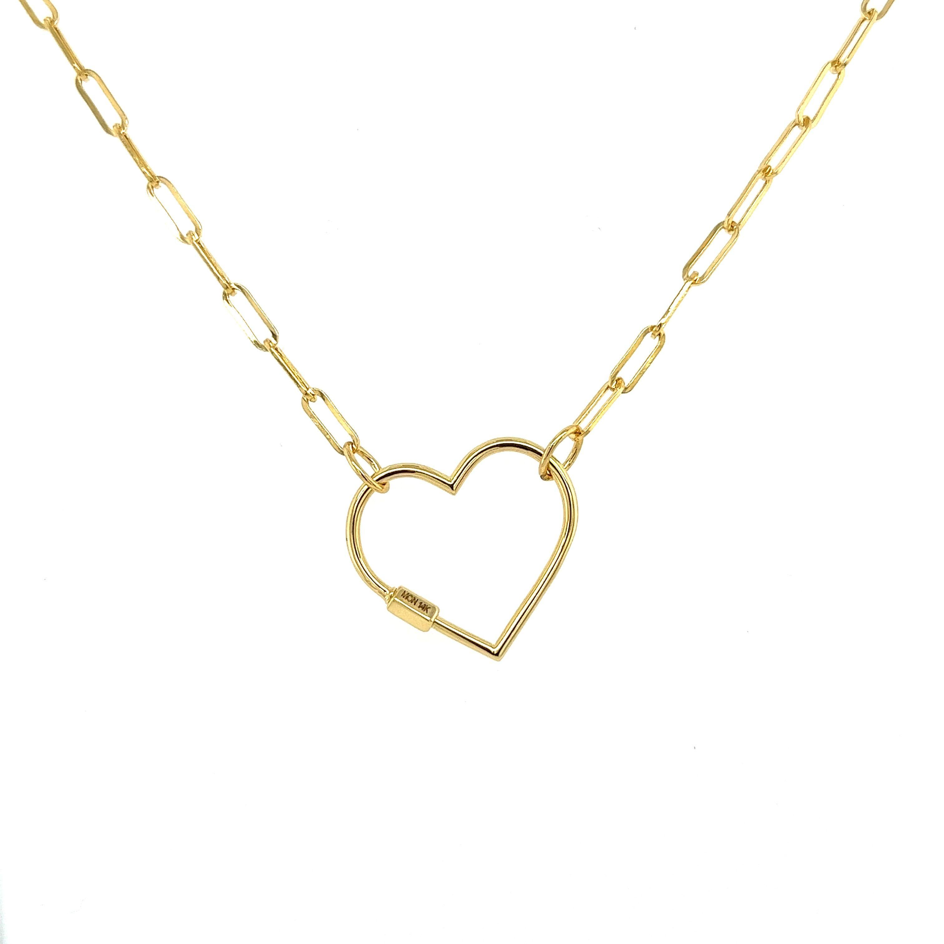 14-karat real, solid gold heart charm pendant mounted in a semi-hollow 14-karat gold paper clip chain. The chain closure lies at the heart, a symbolic and metaphoric design that opens and closes only for those who gift and receive. 

This necklace