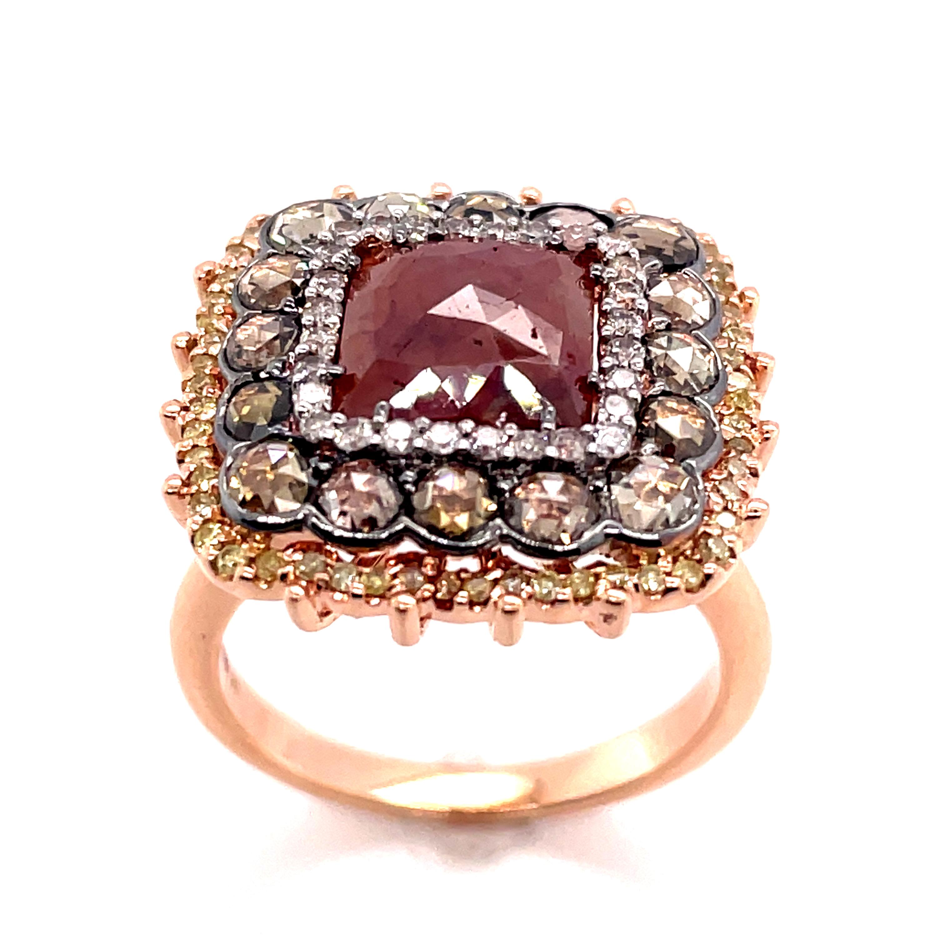 A beautiful 14Kt rose gold diamond ring featuring Checkerboard & Square Brown & Yellow Diamond Cabochon, Rose Cut Brown Diamonds, Round Brilliant Yellow Diamonds & Round Brilliant Diamonds. Some of the fancy colored stones are treated to enhance the