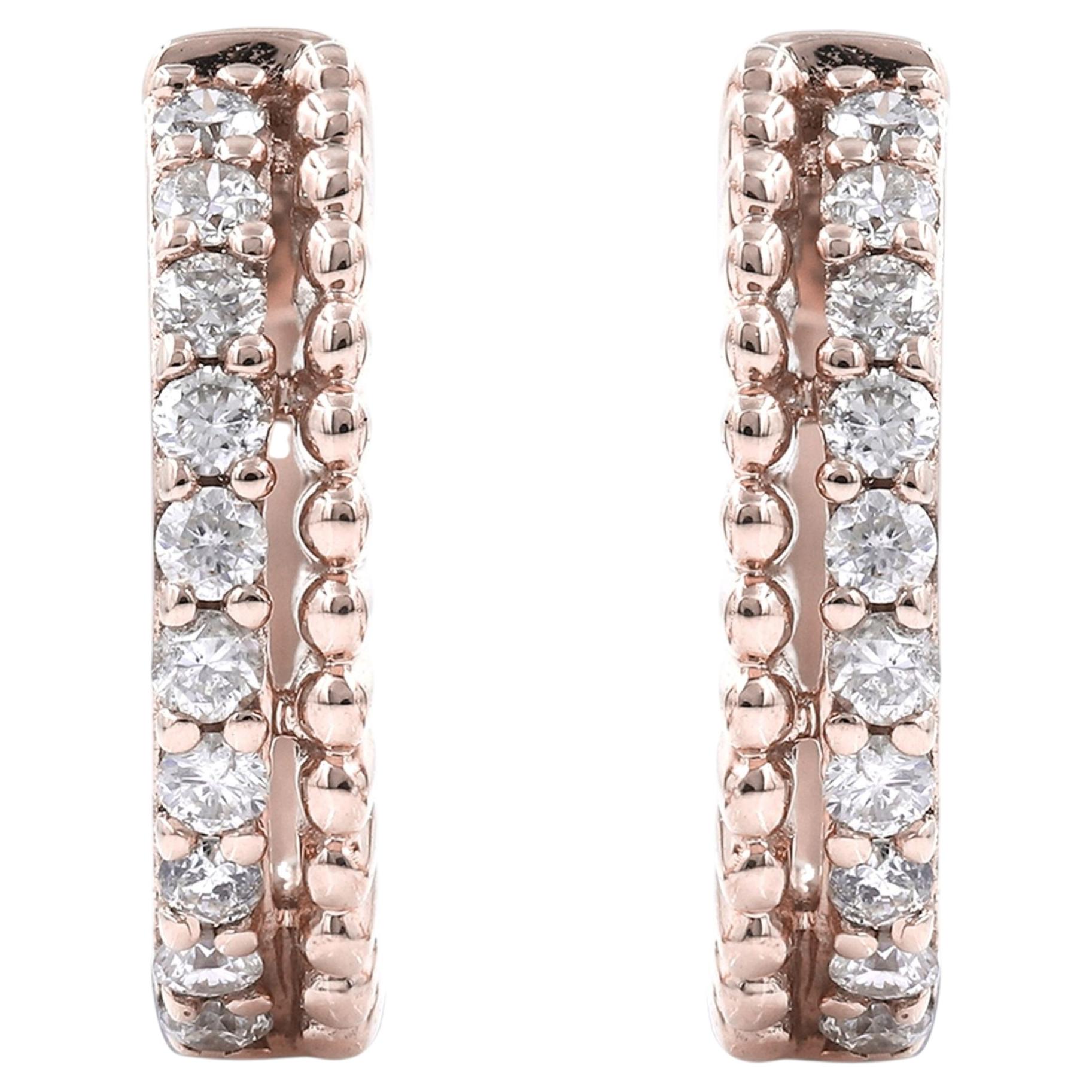 Orecchini a cerchio "huggie" a doppia fila con diamanti in oro rosa 14 carati