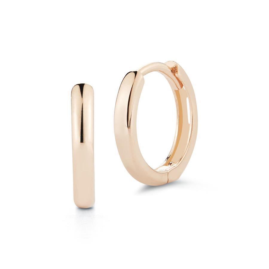 Beautifully made in New York of 14kt rose gold with a hinge and snap closure. They are perfect for every day wear. One almost will forget they have them on.  Looks fantastic layered or worn on its own.