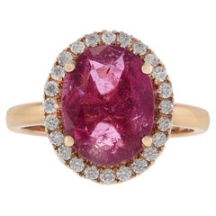 14KT Rose Gold Oval Cut Rubellite and Diamond Halo Ring