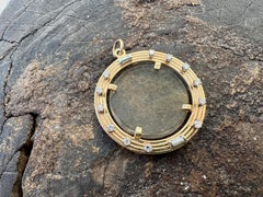 14kt rutilated Quartz, gold and diamond pendant