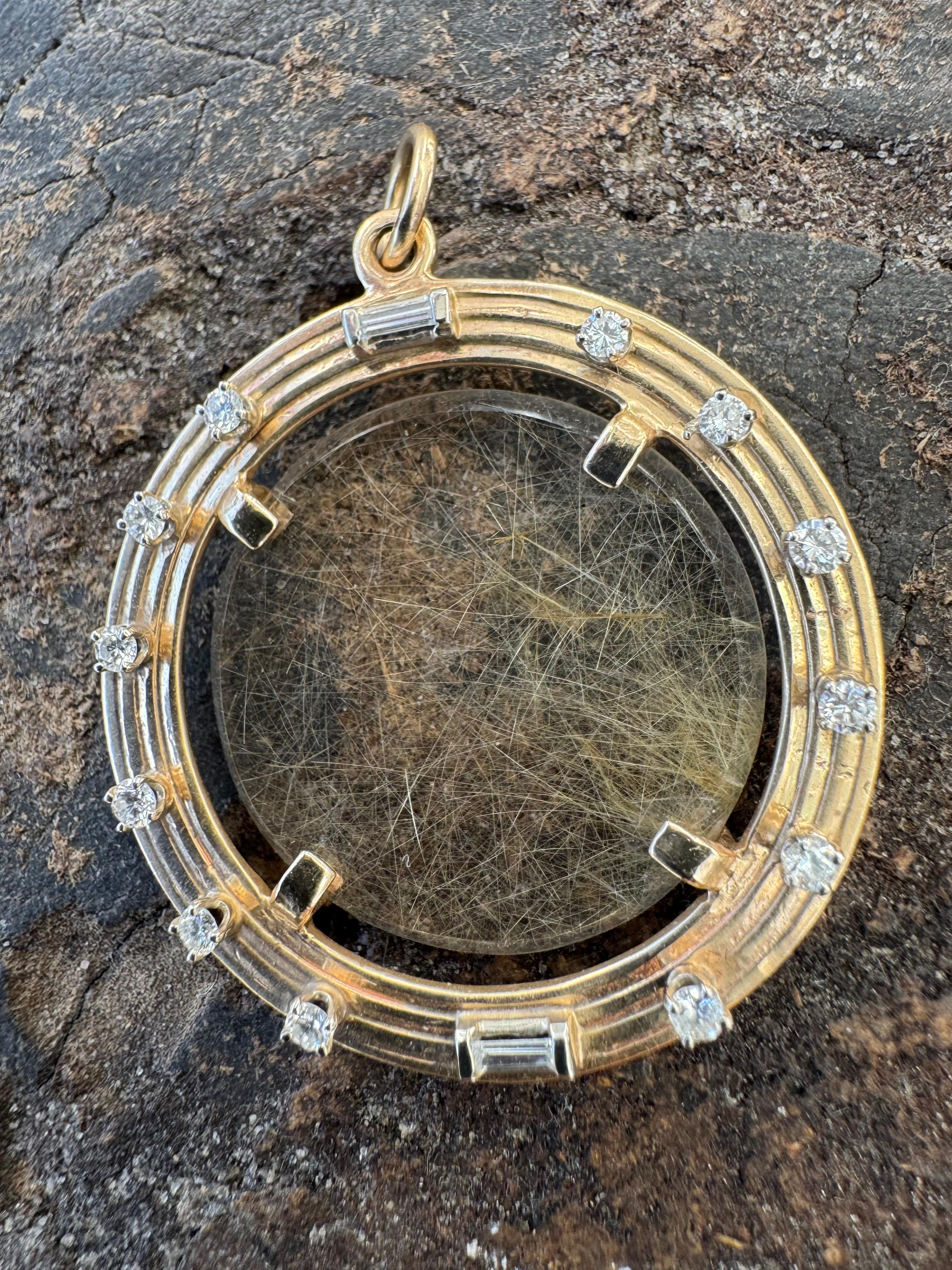 Contemporary 14kt rutilated Quartz, gold and diamond pendant For Sale