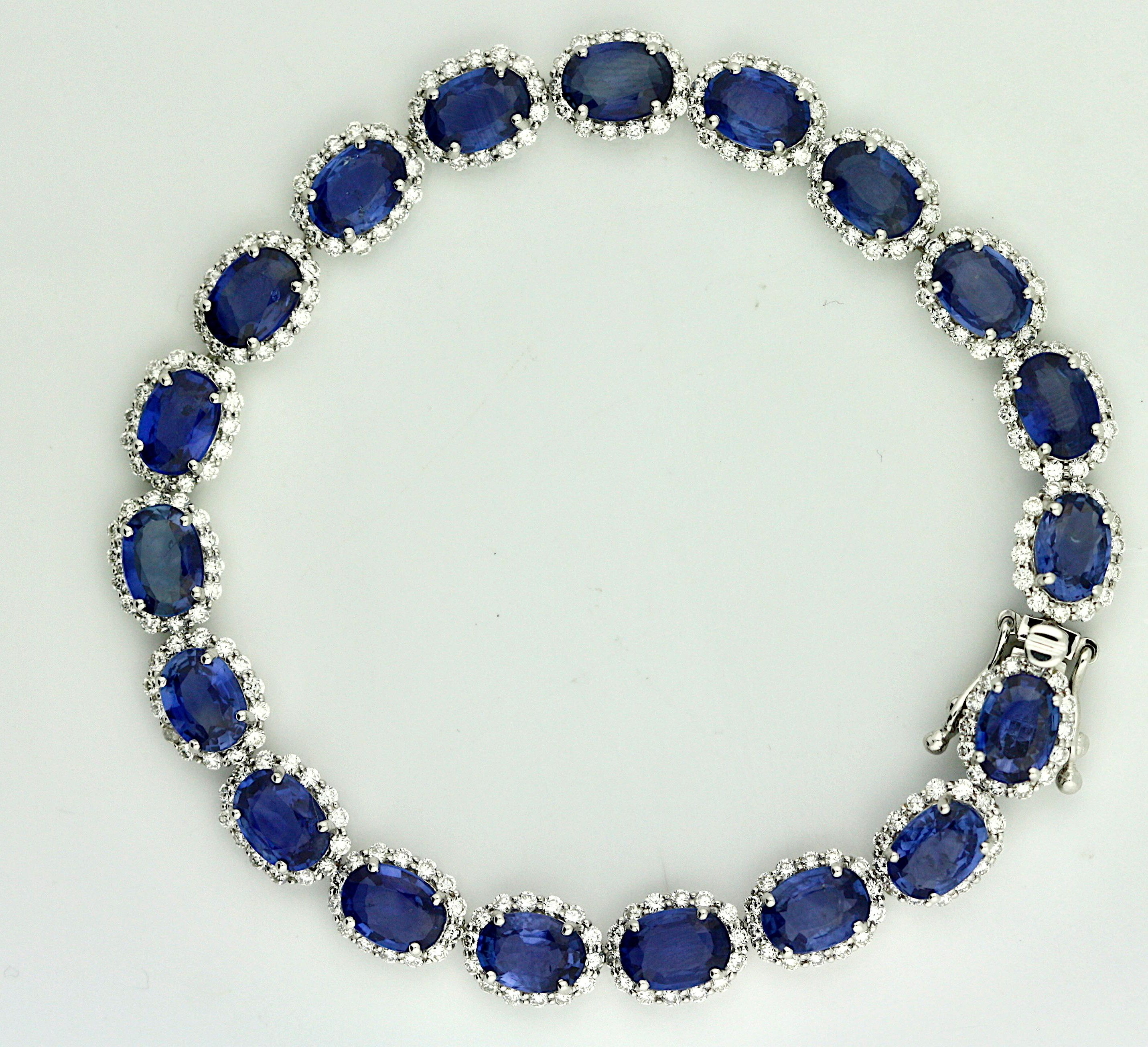 
14Kt Sapphire and Diamond Bracelet 
Set with oval and mixed-cut blue sapphires, weighing approximately 17.53 carats, within a surround of two-hundred sixty-six round brilliant-cut diamonds weighing approximately 2.86 carats. 
Total weight