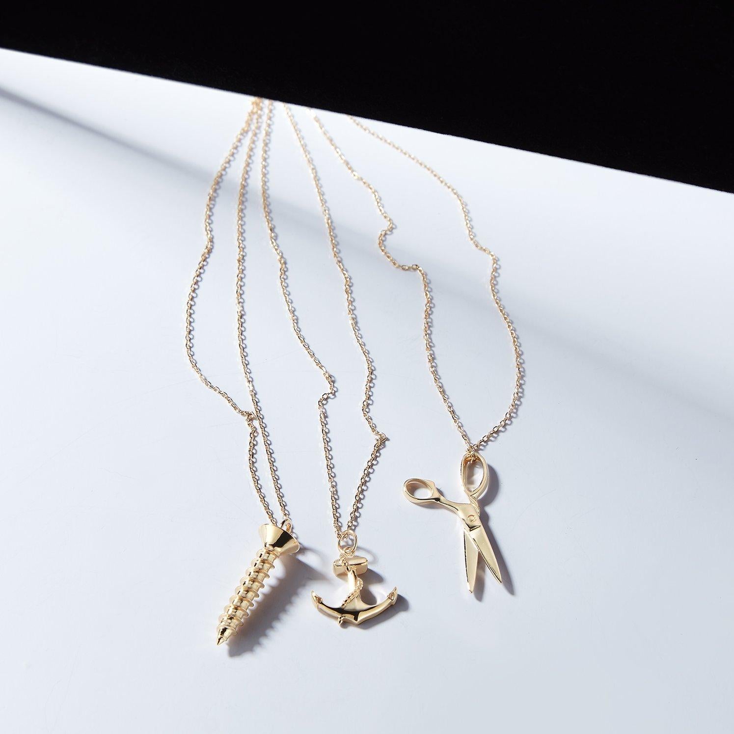 Made of solid gold, the screw you necklace is one of our signature necklaces from Mateo's 