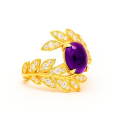14kt solid gold ring with amethyst cabochon