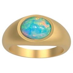 Ring aus 14-karätigem massivem Gold mit Opal-Cabochon