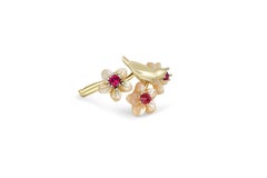 Anillo de oro macizo de 14 quilates con granates redondos