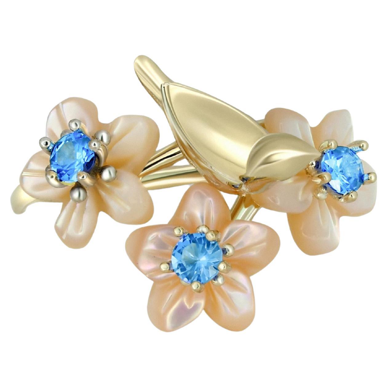 14kt solid gold ring with round topazes