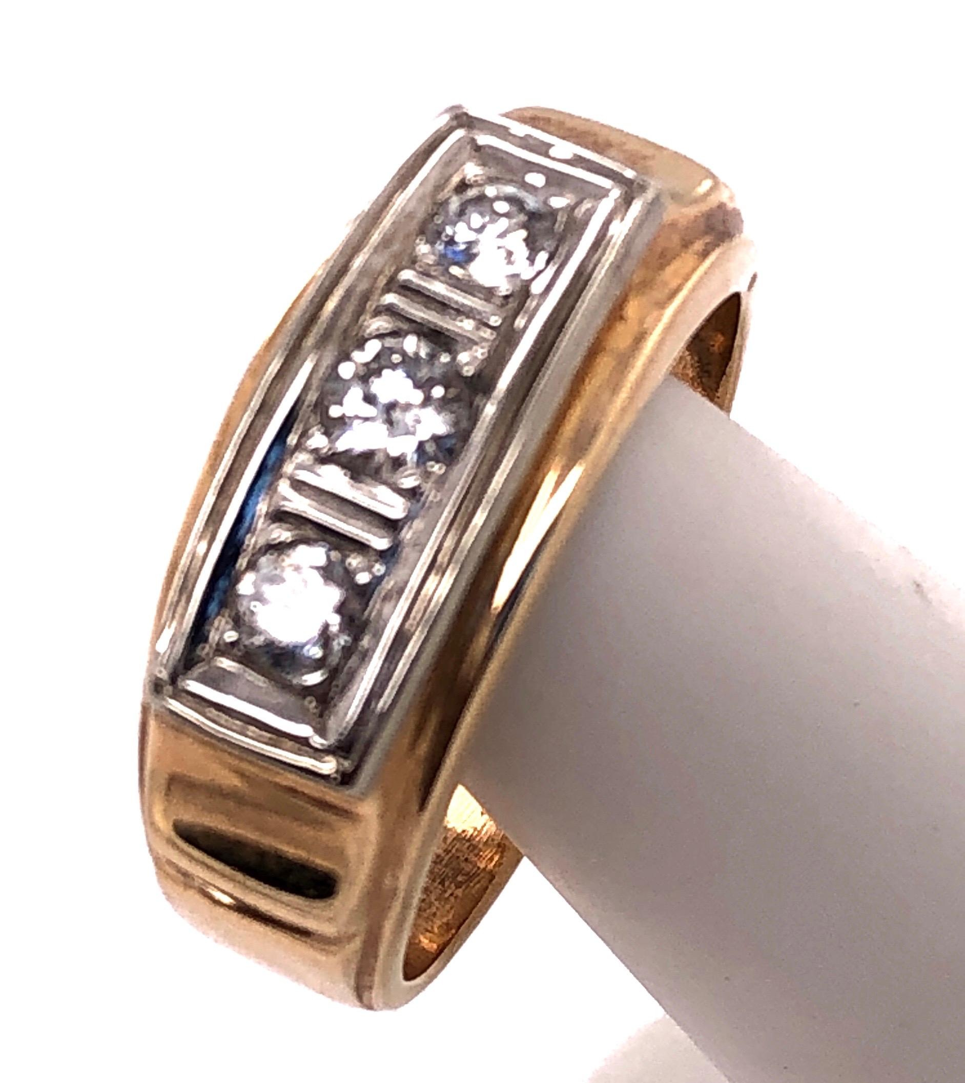 14Kt Three Diamond Yellow And White Gold Ring Or Wedding Band 0.36 TDW
Size 11.5 
6 grams total weight.