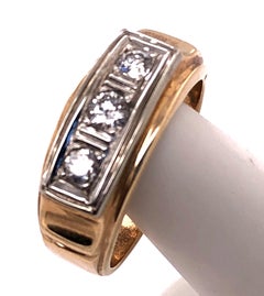 Bague ou alliance en or jaune et blanc 14 carats à trois diamants 0,36 TDW