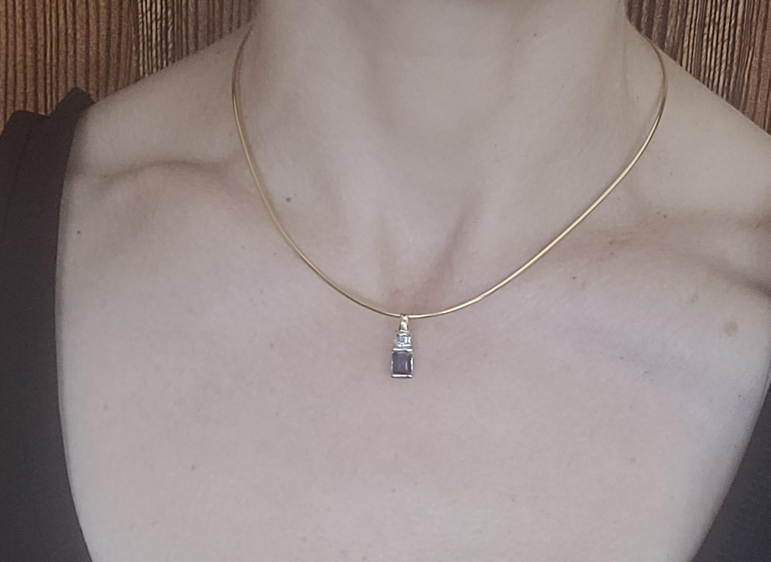 14kt Two-Tone Gold 1.00Ct Emerald Cut Sapphire .10cttw Baguette Diamond Pendant  In Good Condition For Sale In Rancho Santa Fe, CA