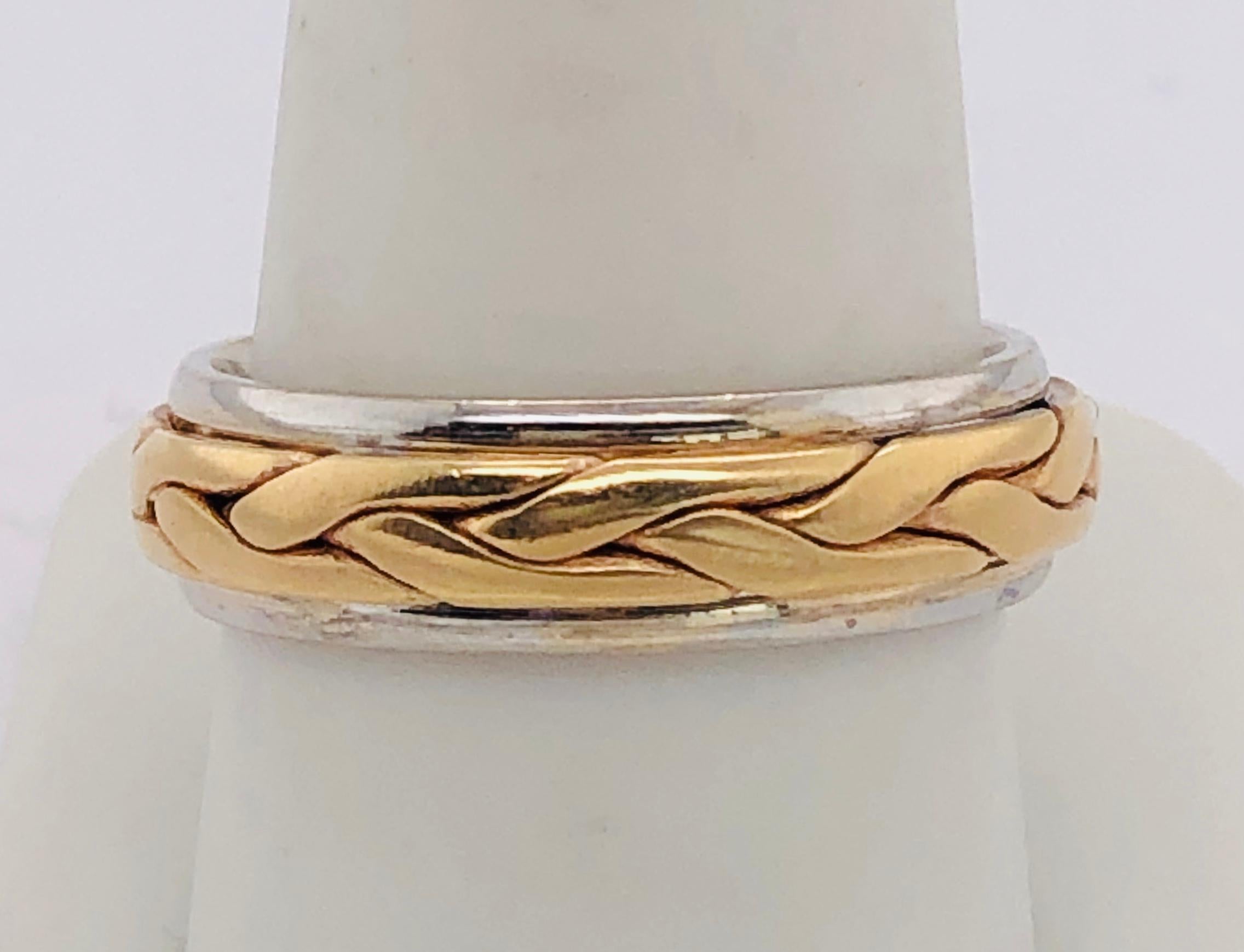 14Kt Two Tone Gold Braid Styled Band Ring
Size 10 
Change tag number to 223