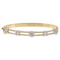 14KT Two-Tone Gold Diamond Bangle Bracelet with Round and Baguette Cuts