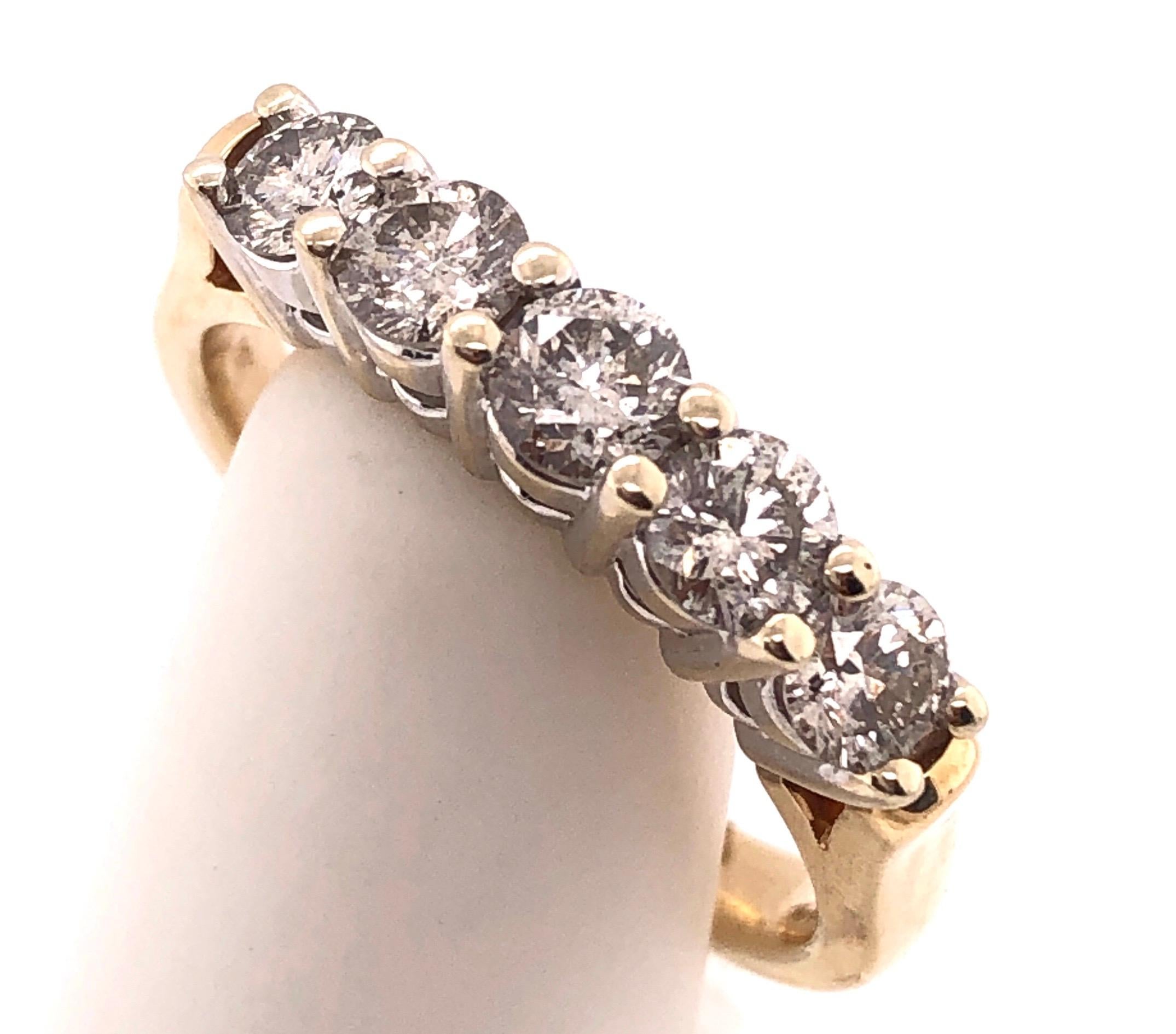 14Kt Two Tone Gold Ring With Five Round Diamonds One Ct Total Diamond Weight. 
Size 7. 1.00 total carat weight.  4.6 grams total weight.