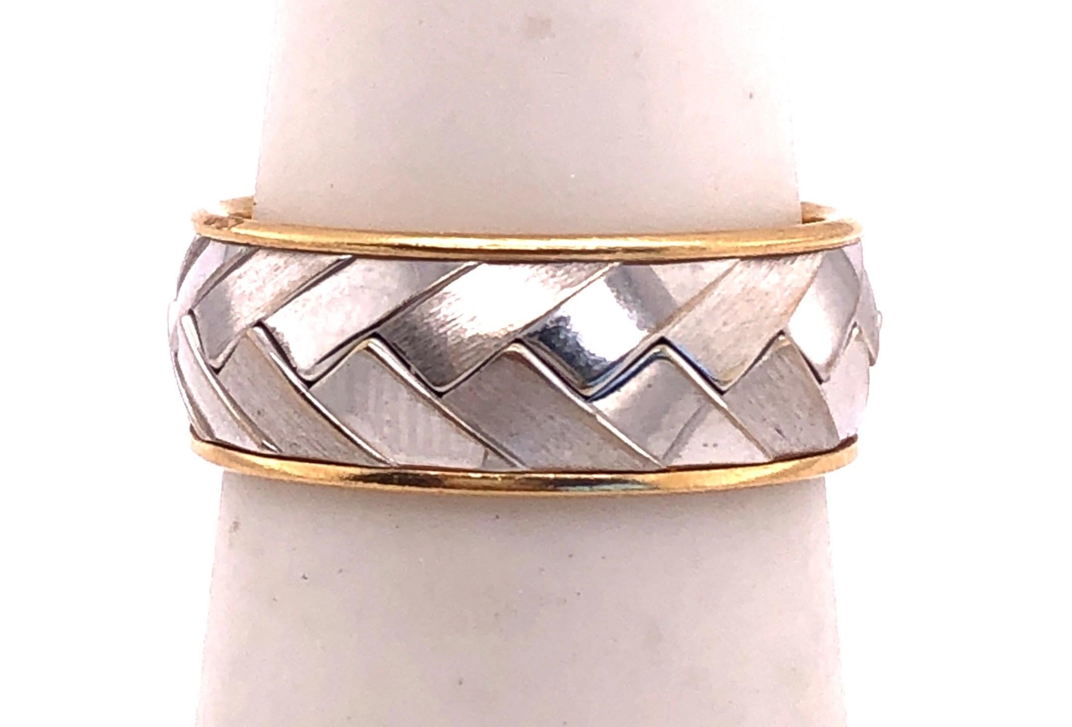 14Kt Two Tone White And Yellow Gold Weave Style Band Ring  
Size 6 . 5   .81 grams total weight