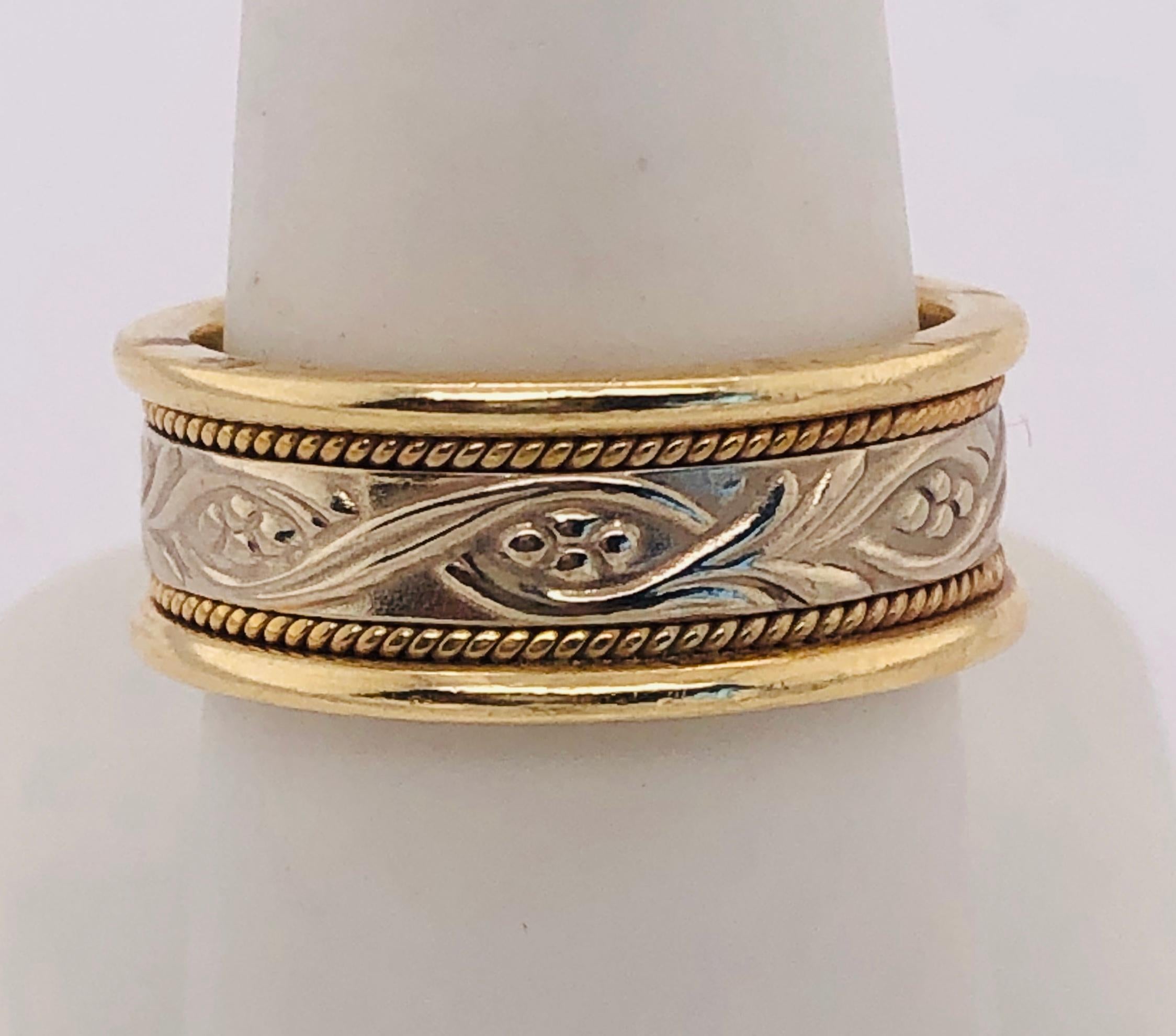 14KT Two Toned Fashion Ring Size 8.75 with 9.87 grams total weight. Designer initialed KRS








