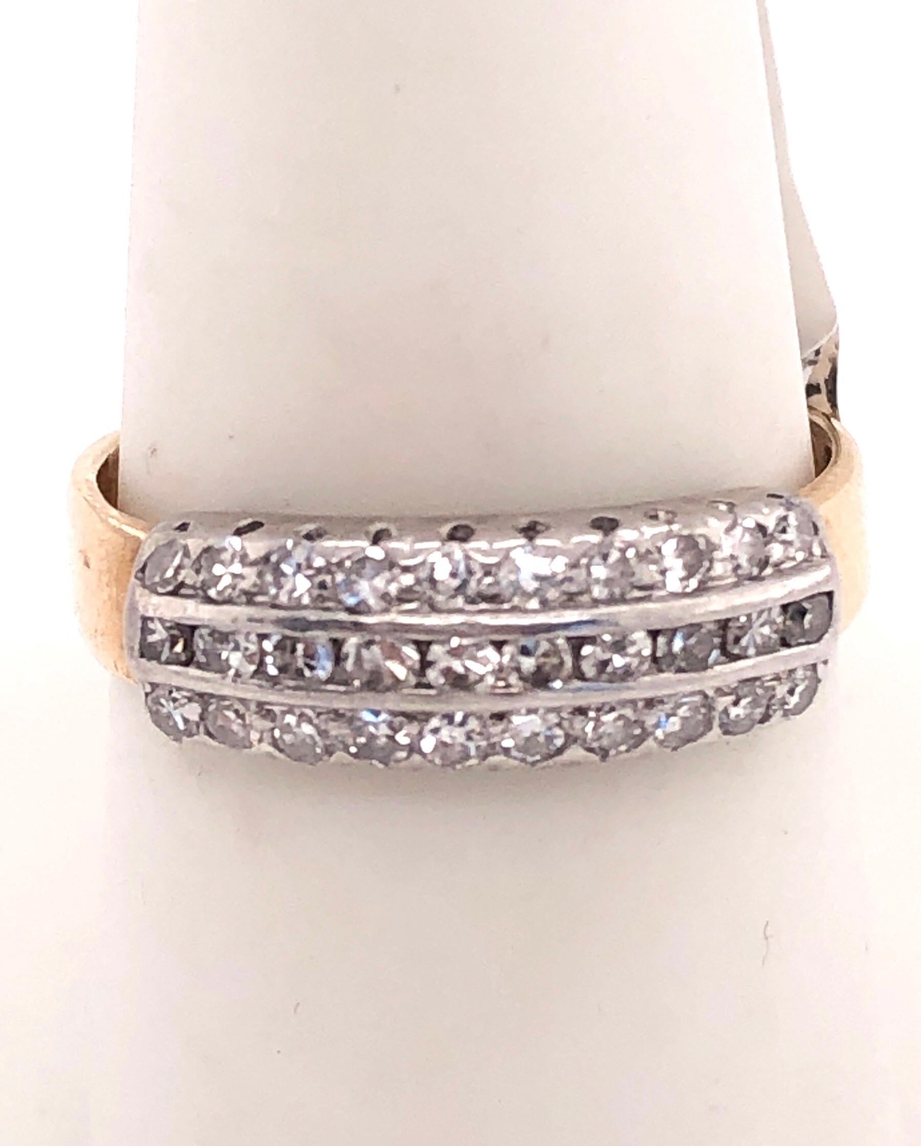 14Kt Two Toned Ring with Diamonds. 6.5 size, 30 diamonds 1 Ct TDW, 2.81 grams total weight.