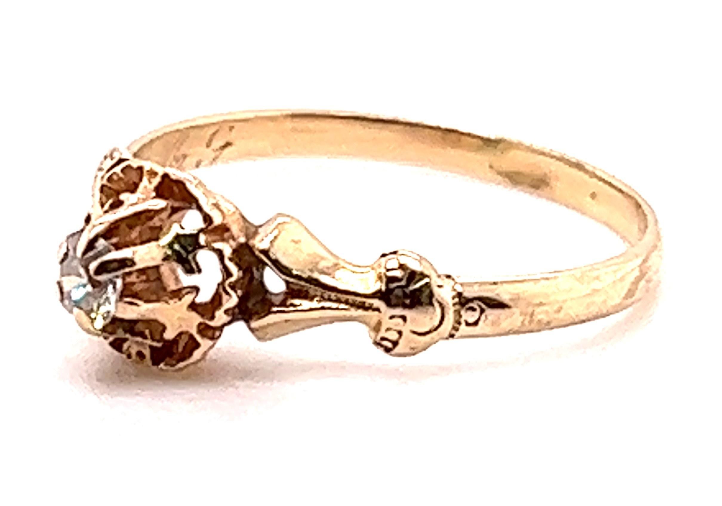 14kt yellow gold late Victorian ring with a 6-prong Belcher type setting for a .15 carat Old Mine Cut Diamond. The diamond possesses I-J color and SI1-SI2 clarity. 

The ring measures 5/8 inch from shoulder to shoulder and the head measures 1/4 inch