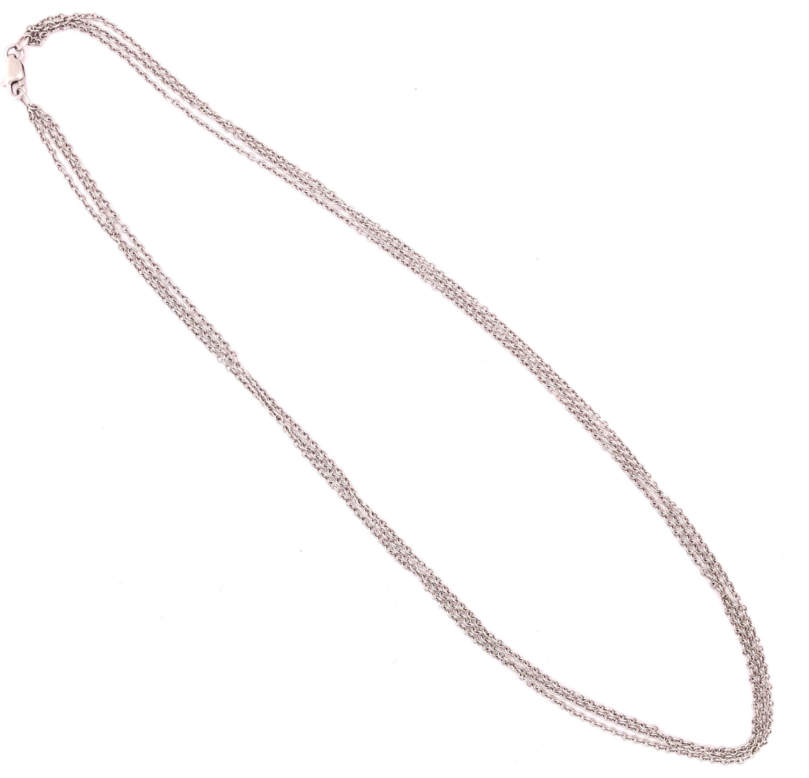 collier à trois brins en or blanc 14Kt de 16 pouces à maillons câblés
5.poids total de 64 grammes
