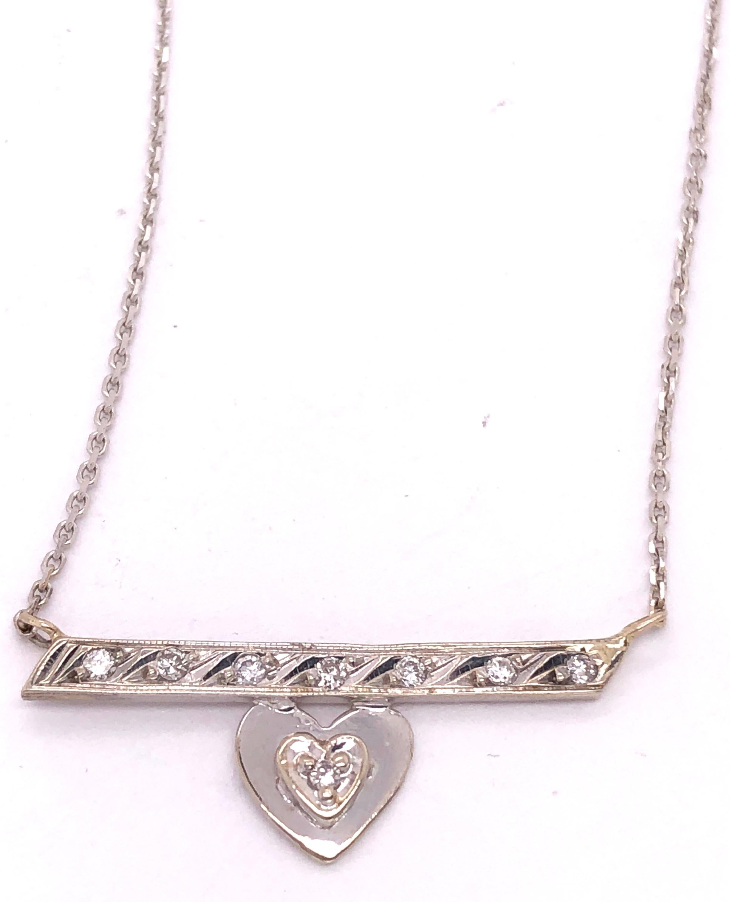 collier en or blanc 14Kt de 18 pouces avec breloque cœur de forme libre avec diamants
0.08 Poids total des diamants
2.7 grammes de poids total