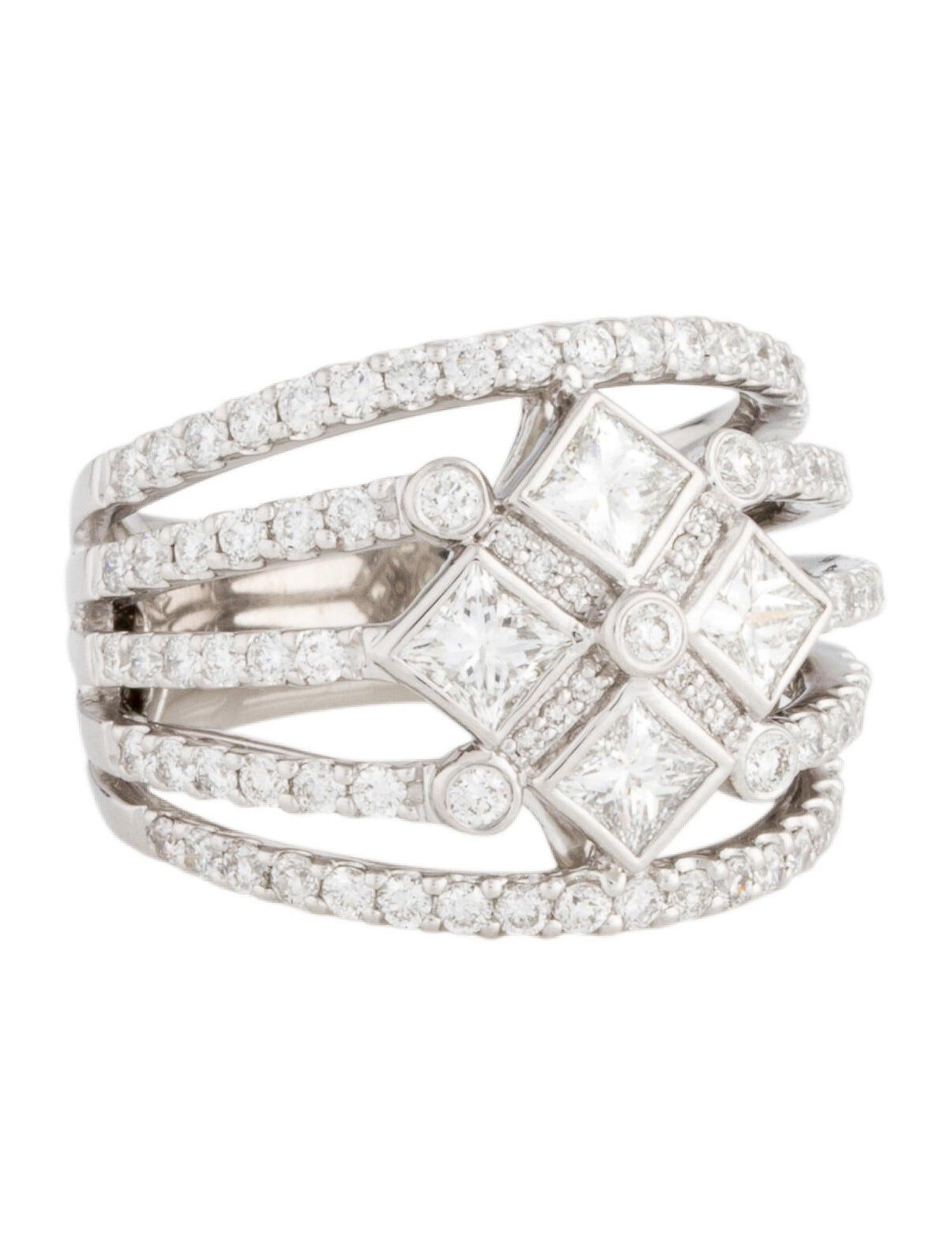 A beautiful 14Kt white gold diamond band featuring 1.06 carats of round brilliant diamonds and 1.04 carats of square modified brilliant diamonds. There are 4 princess cut diamonds and 89 round brilliant cut diamonds set in this band. The round