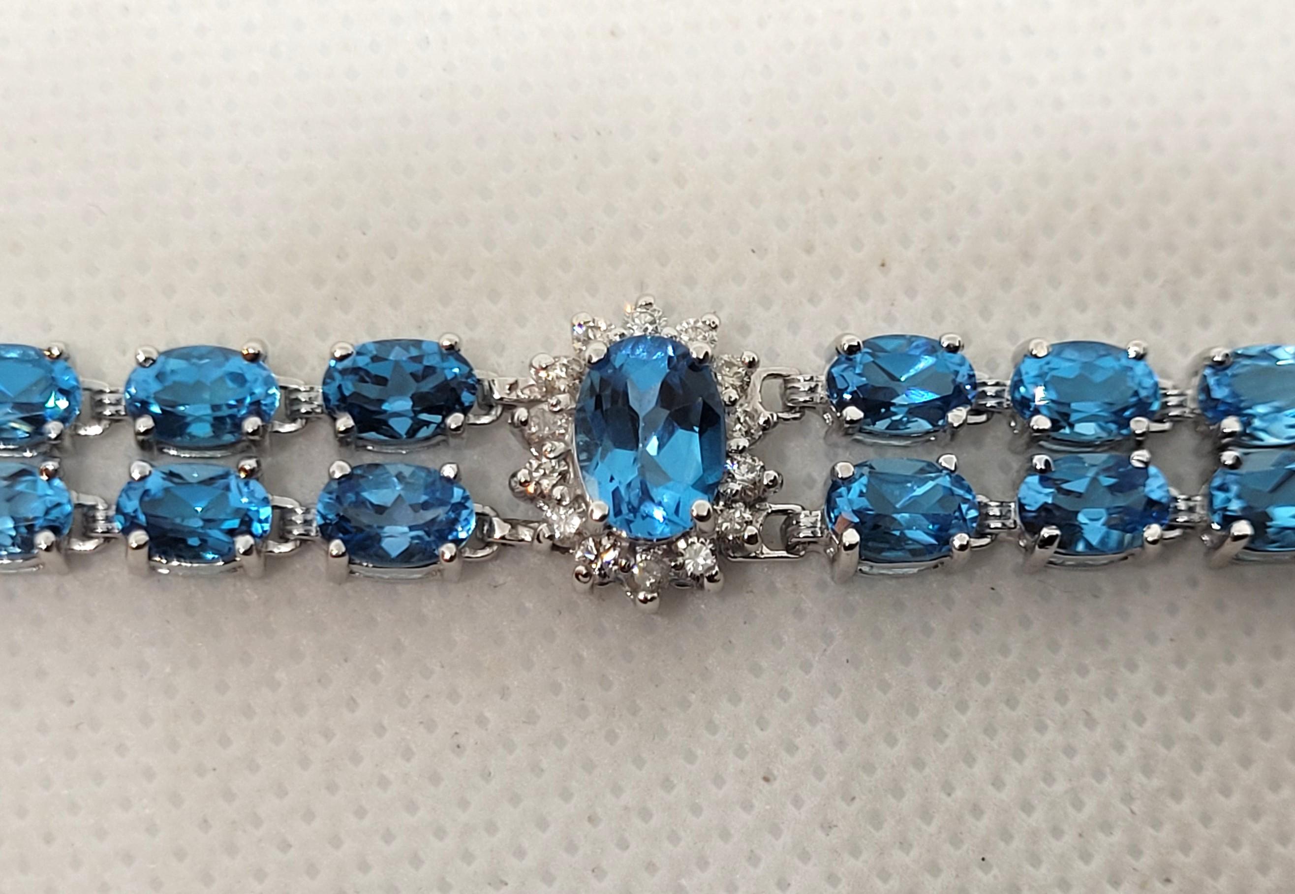 Oval Cut 14kt White Gold 50.50cttw Oval Natural Blue Topaz & 1.60cttw Diamond Bracelet For Sale
