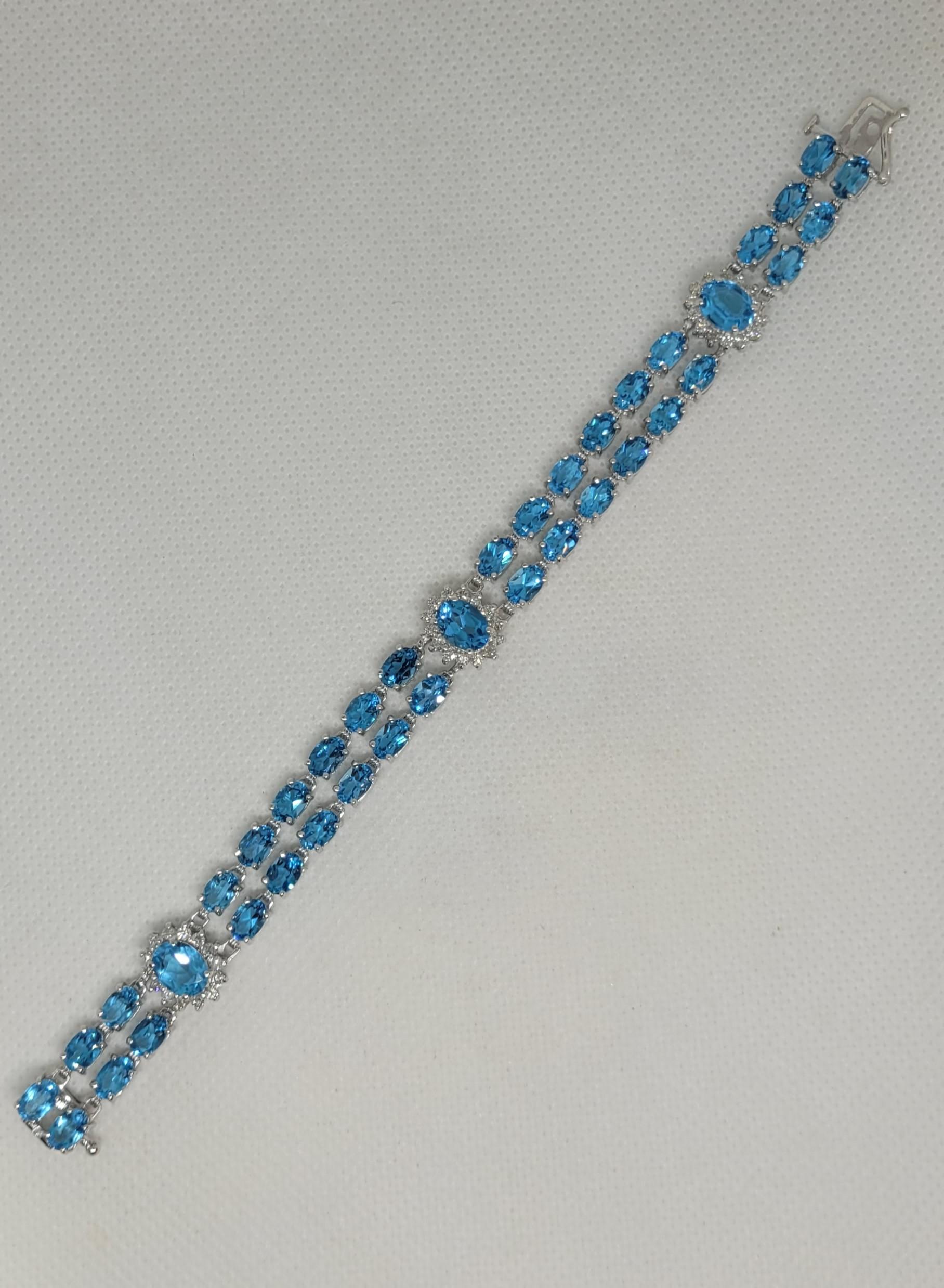 14kt White Gold 50.50cttw Oval Natural Blue Topaz & 1.60cttw Diamond Bracelet For Sale 2