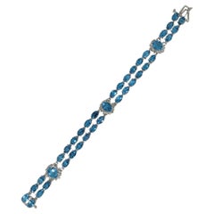 14kt White Gold 50.50cttw Oval Natural Blue Topaz & 1.60cttw Diamond Bracelet