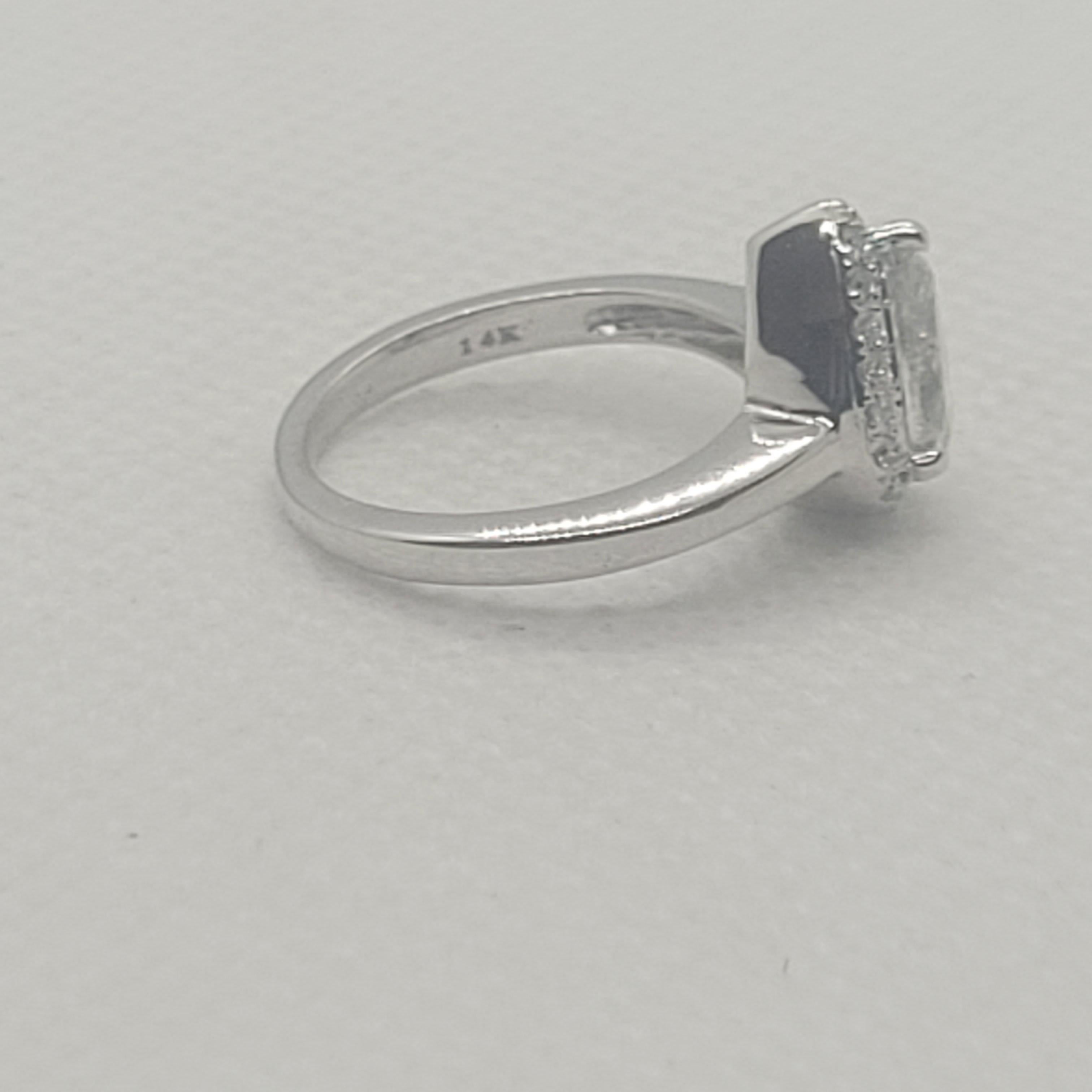 14kt White Gold .80ct Pear Cut Diamond Halo Ring, 18 Round Brilliant Diamonds In Good Condition For Sale In Rancho Santa Fe, CA