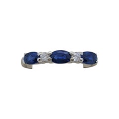 14kt White Gold .80cttw Oval Sapphire and .05cttw Round Diamond Ring, Size 7