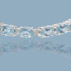 14KT White Gold Aquamarine and Diamond Tennis Bracelet