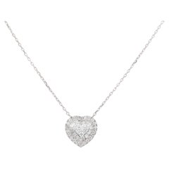 Collana con ciondolo a forma di cuore in oro bianco 14KT con diamanti taglio baguette e rotondi