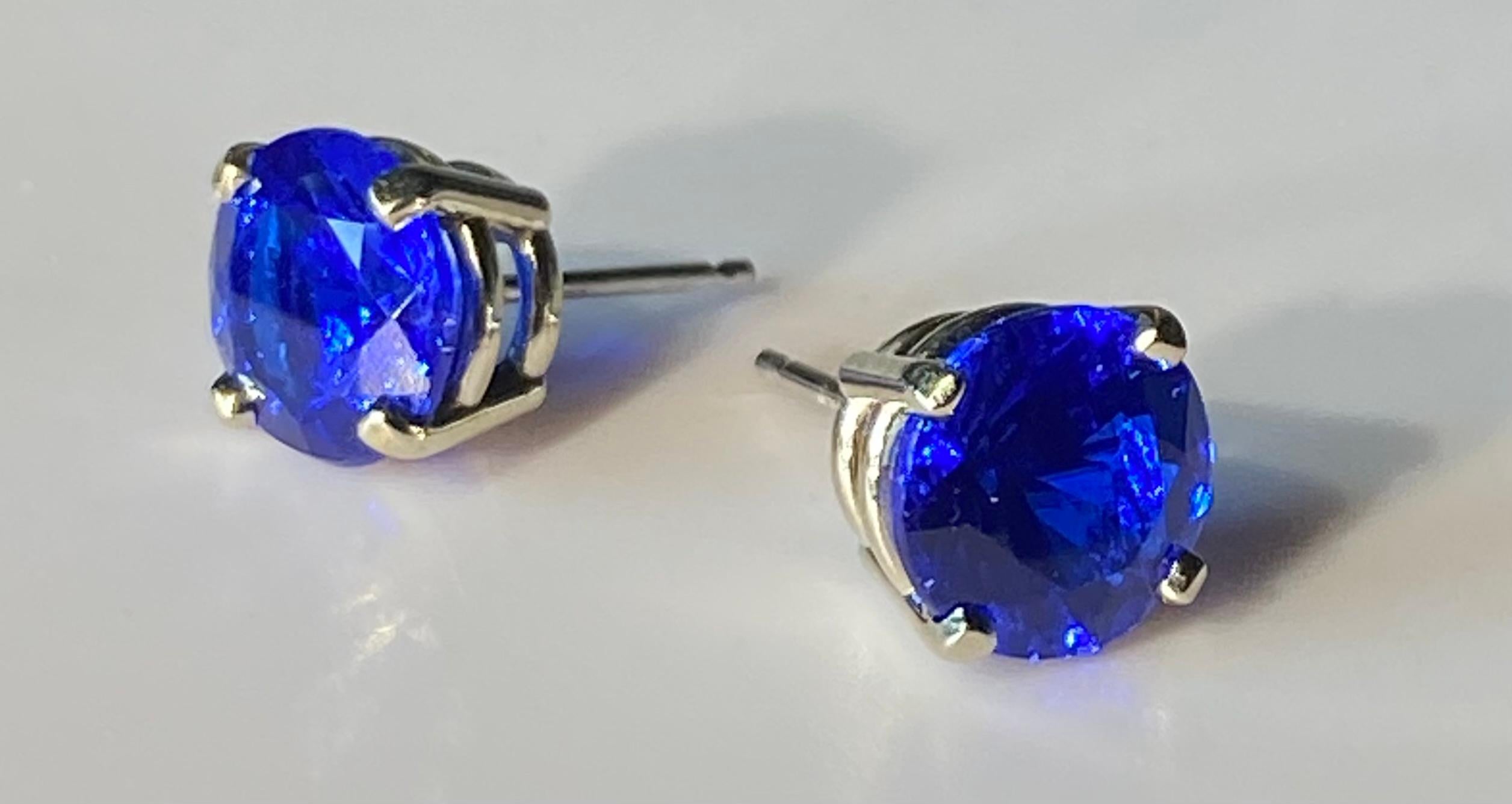 14kt White Gold Stud Earrings set with Blue Garnets., The Vivid Blue Yttrium Aluminum Garnet Earrings stand out and POP.. These are eye catchers and will attract attention..

Originally from San Diego, California, Kary Adam lived in the “Gem Capital