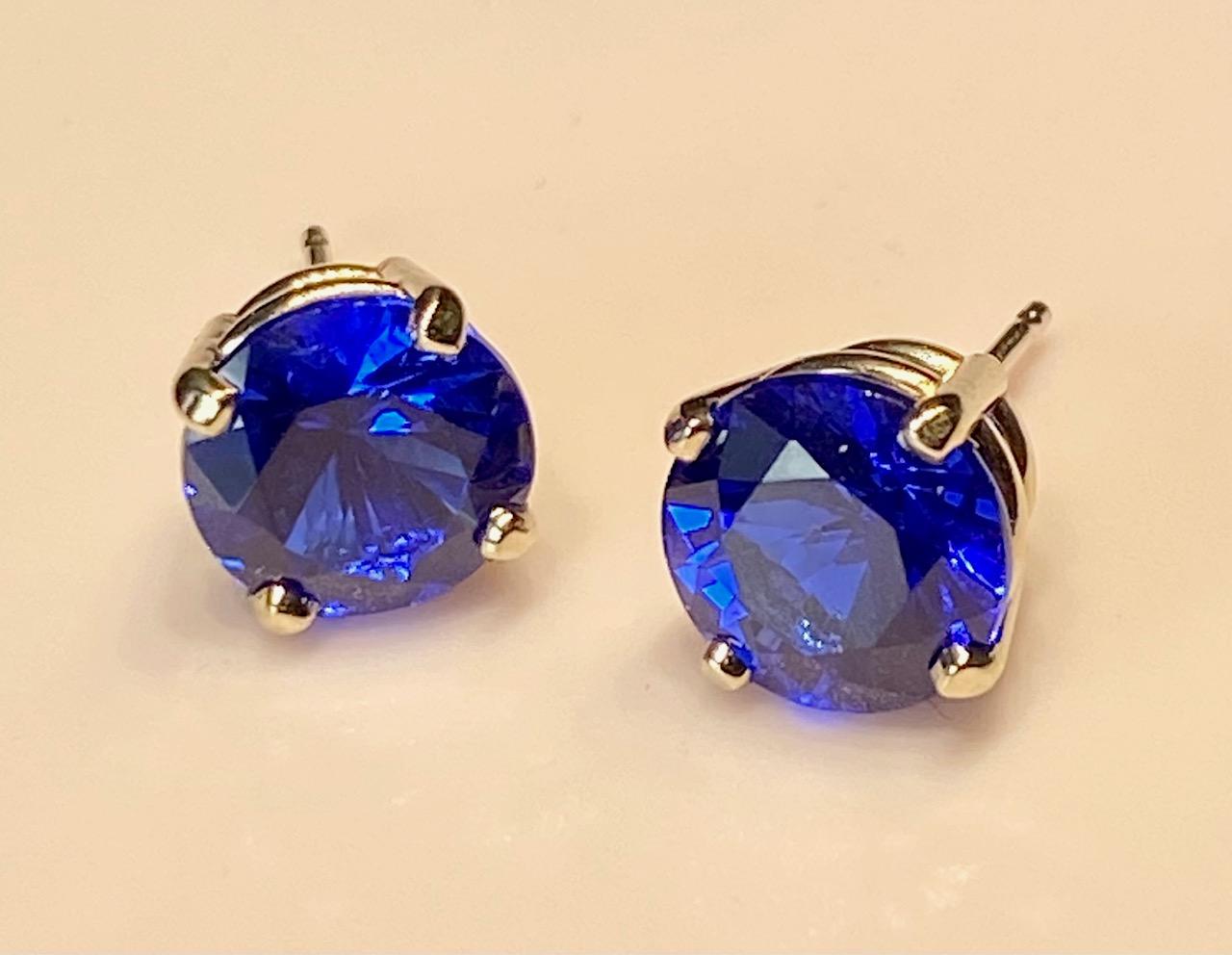 Round Cut 14kt White Gold Stud Earrings set with Blue Garnets For Sale