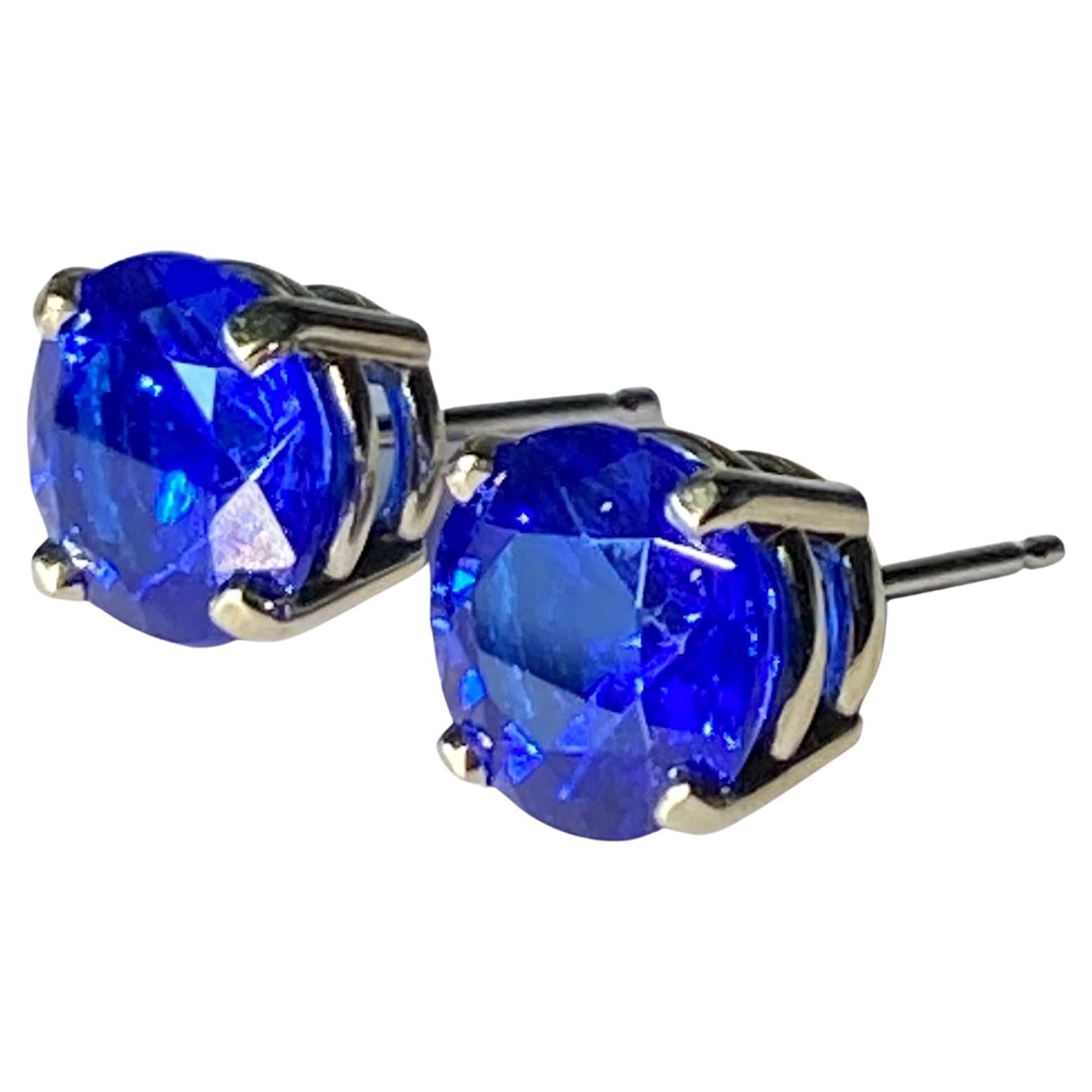 14kt White Gold Stud Earrings set with Blue Garnets