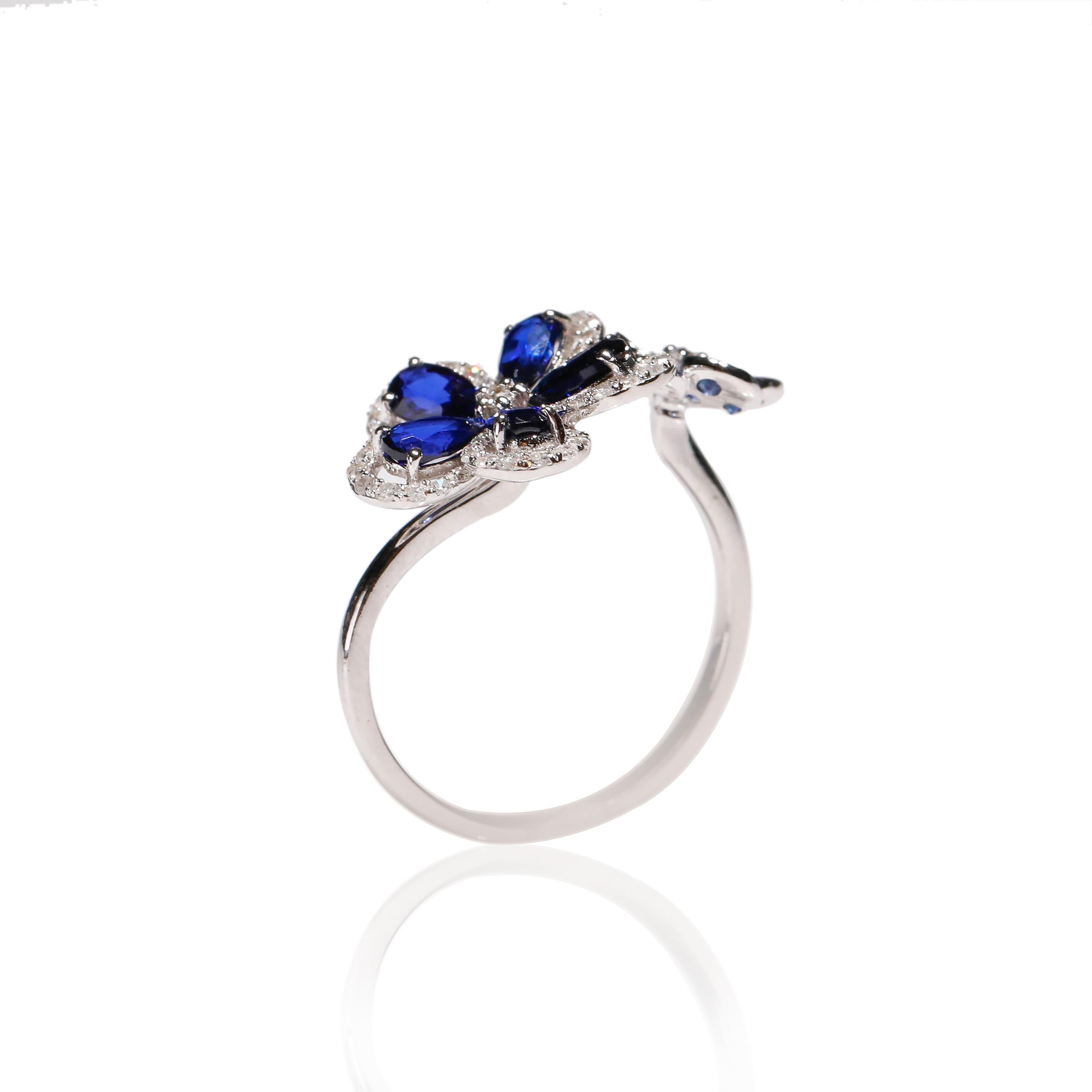 Round Cut 14 Karat White Gold Blue Sapphire 0.29 Carat Diamond Double Flower Bridal Ring For Sale