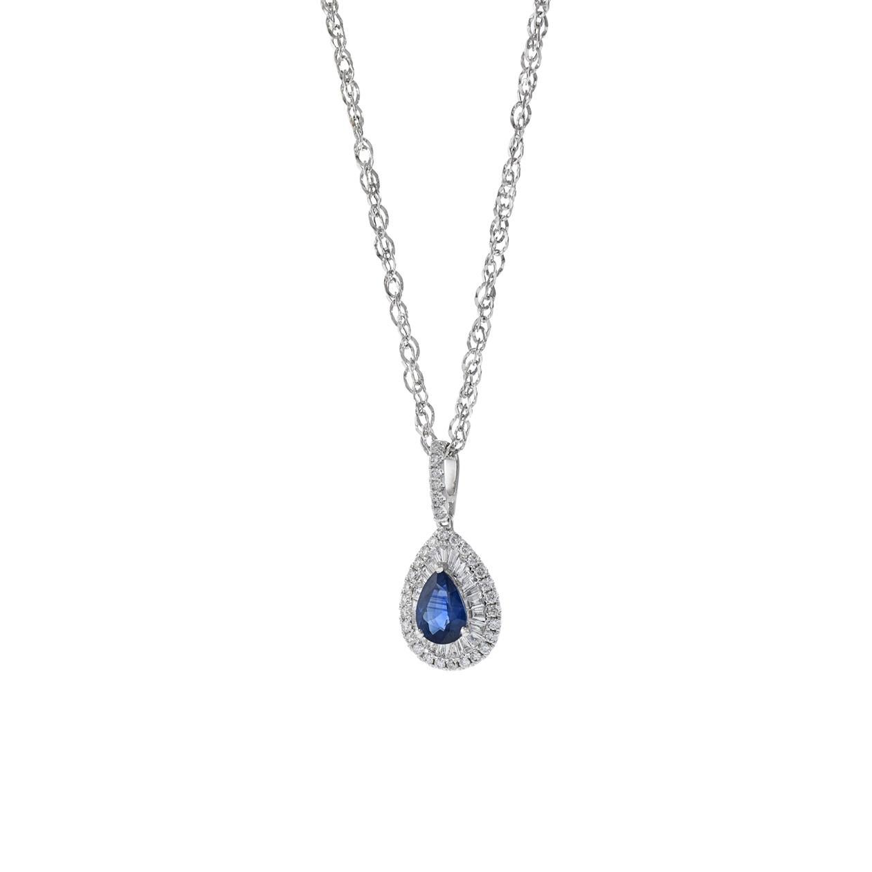 This 14KT White Gold Pear shaped Sapphire and Diamond Pendant Necklace features a 0.89CT Pear Cut Blue Sapphire encircled by a double halo of 0.41CT-TW baguette and round cut diamonds. Length 18 inches. Weight 2.8 grams.