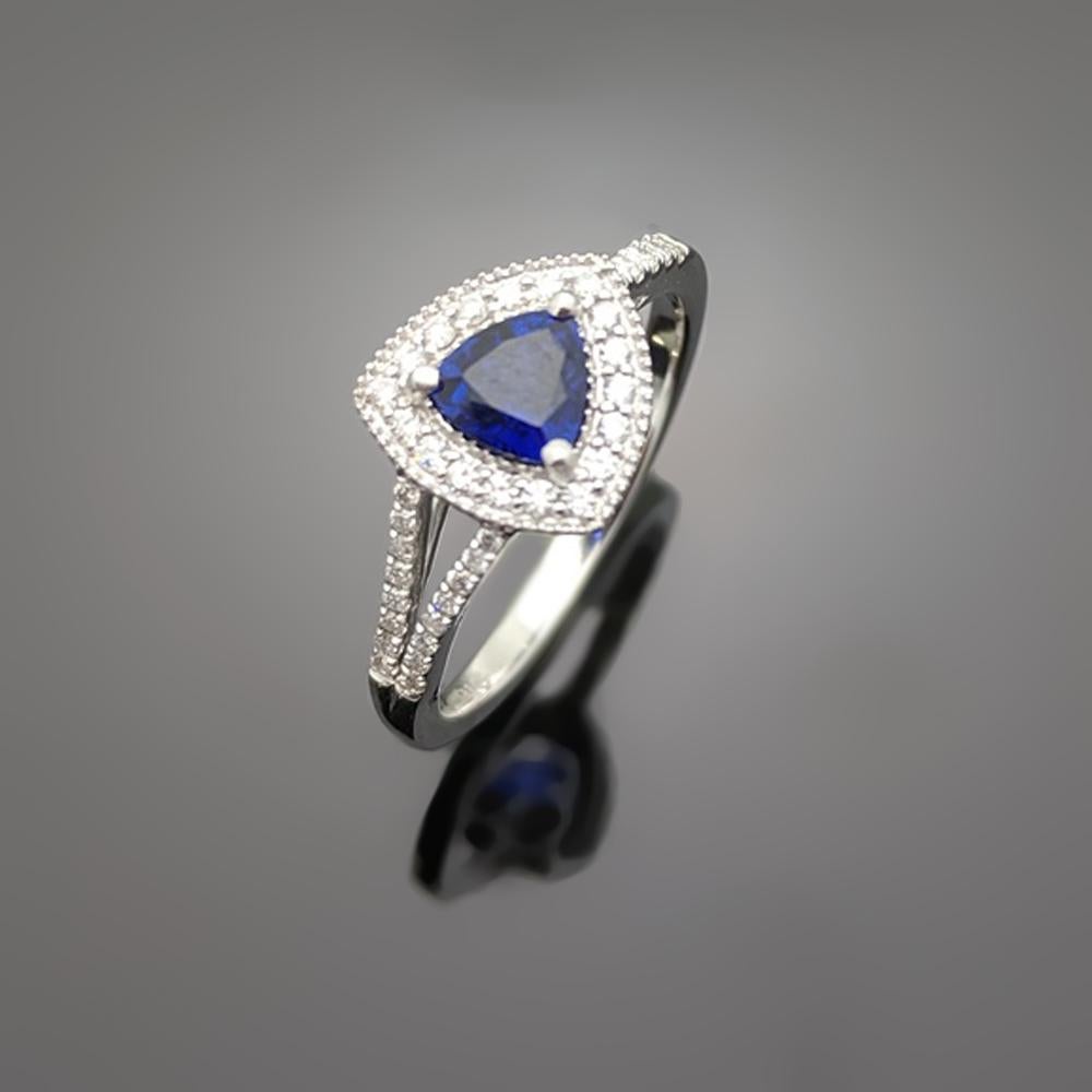 Round Cut 14 Karat White Gold Blue Sapphire and Diamond Ring For Sale