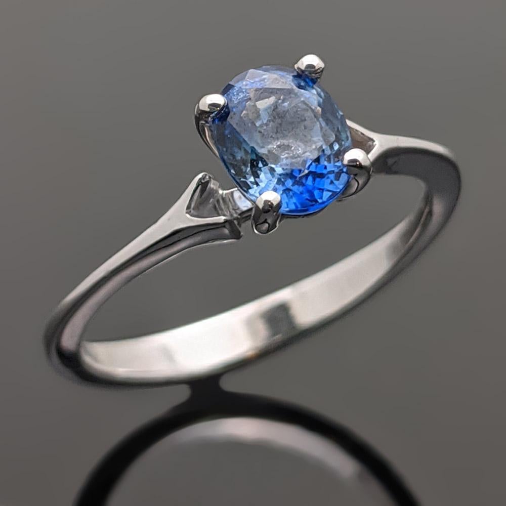 This ring is 14kt white gold featuring a dazzling blue sapphire at an estimated 0.96ct in a 4 prong setting. Estimated weight of gold is 1.8 gr. 
This item is a custom order only. 
Price for the ring set only. The stones will be priced separate.