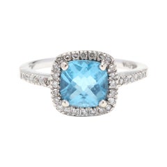 14KT White Gold Blue Topaz 
Diamond Ring
