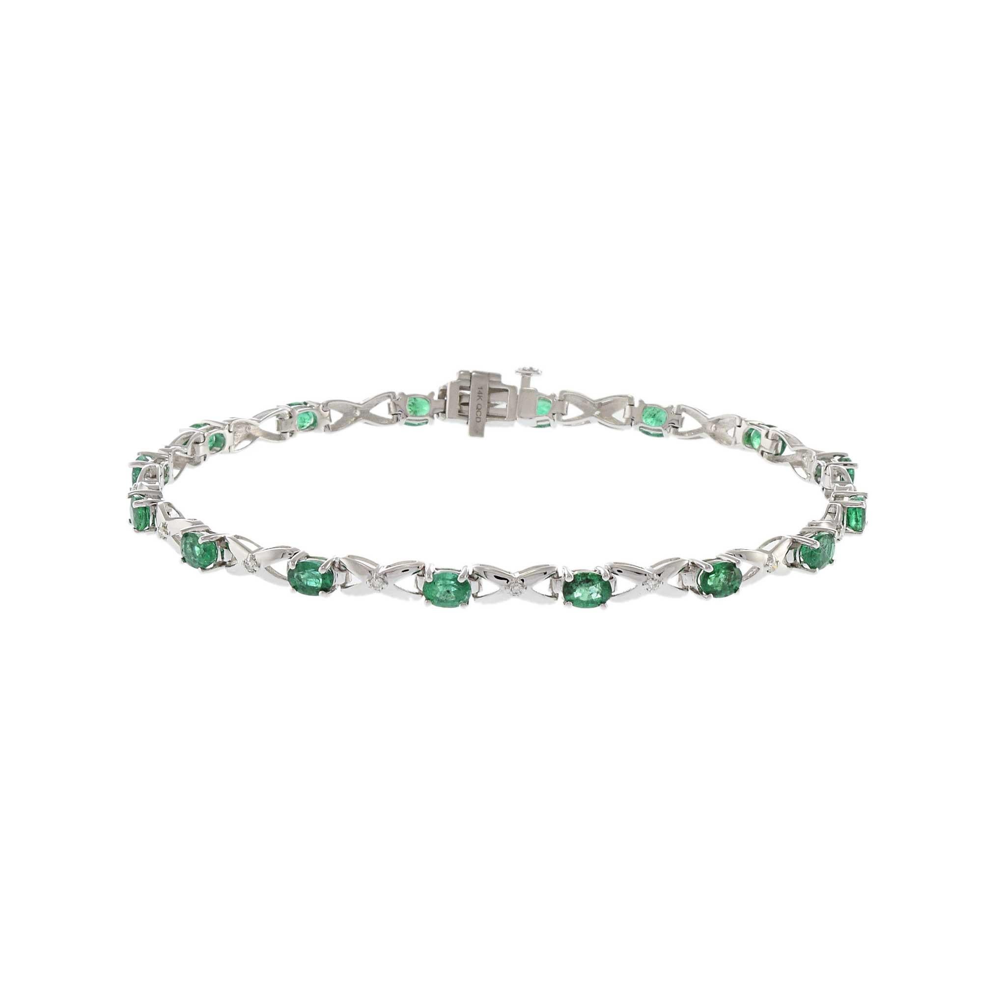 Modern 14KT White Gold Bracelet with Round Cut Diamonds and Oval Emeralds For Sale