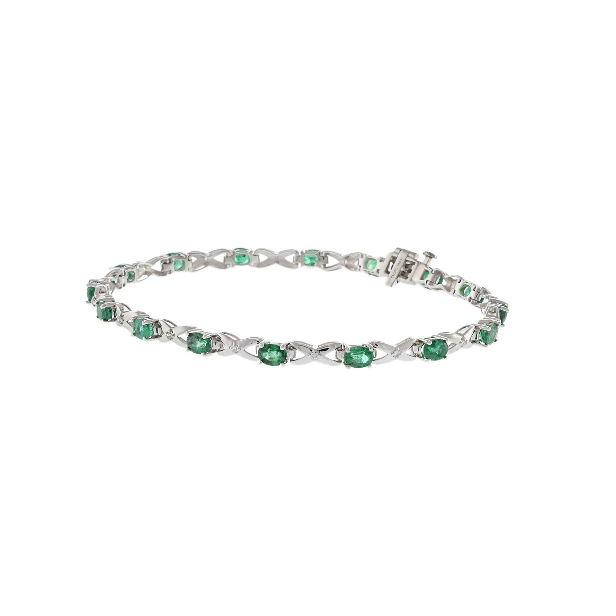 Oval Cut 14KT White Gold Bracelet with Round Cut Diamonds and Oval Emeralds For Sale