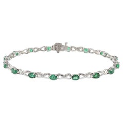 14KT White Gold Bracelet with Round Cut Diamonds and Oval Emeralds