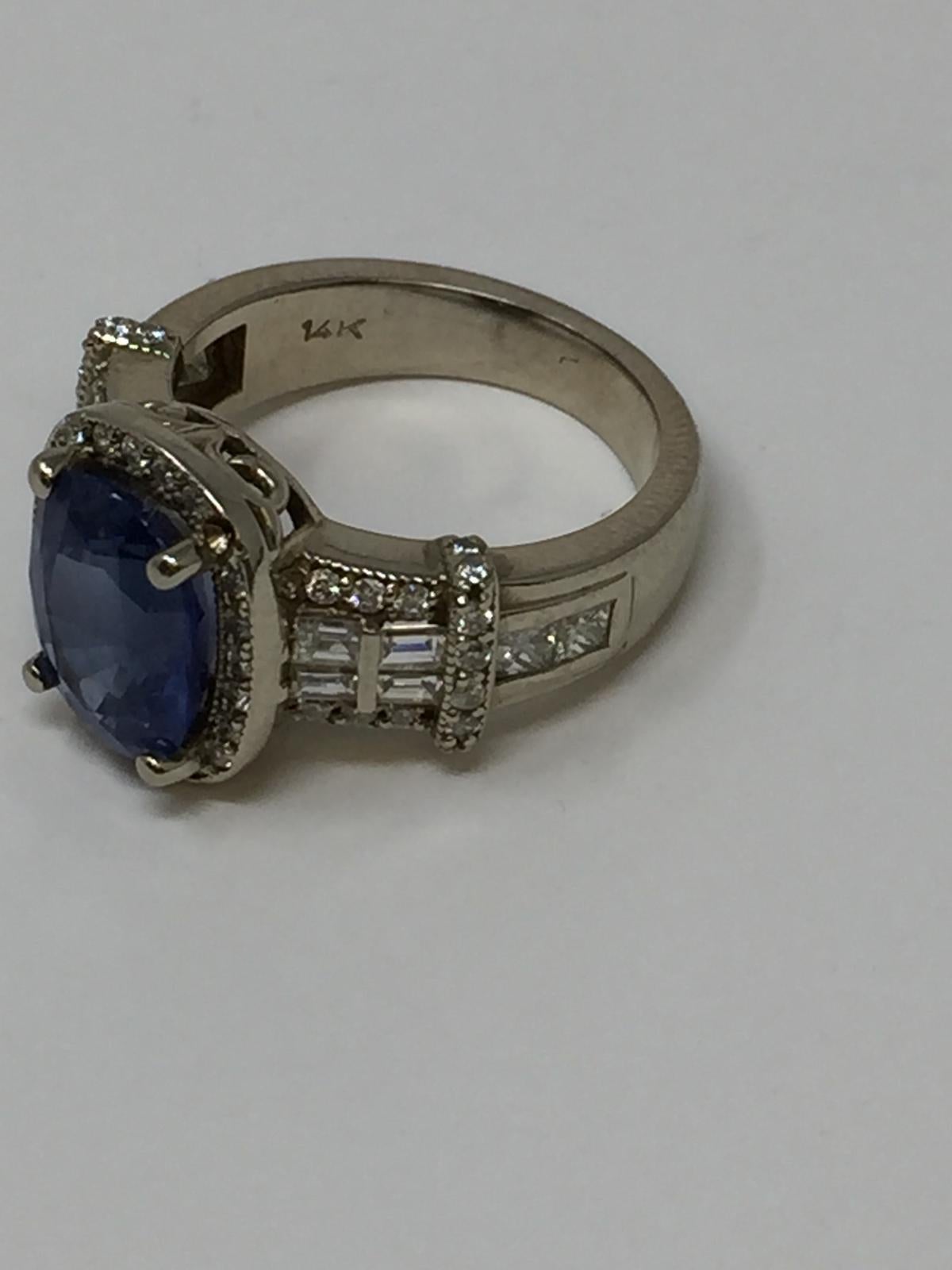Oval Cut 14 Karat White Gold Ceylon Blue Sapphire and Diamond Cocktail Ring For Sale