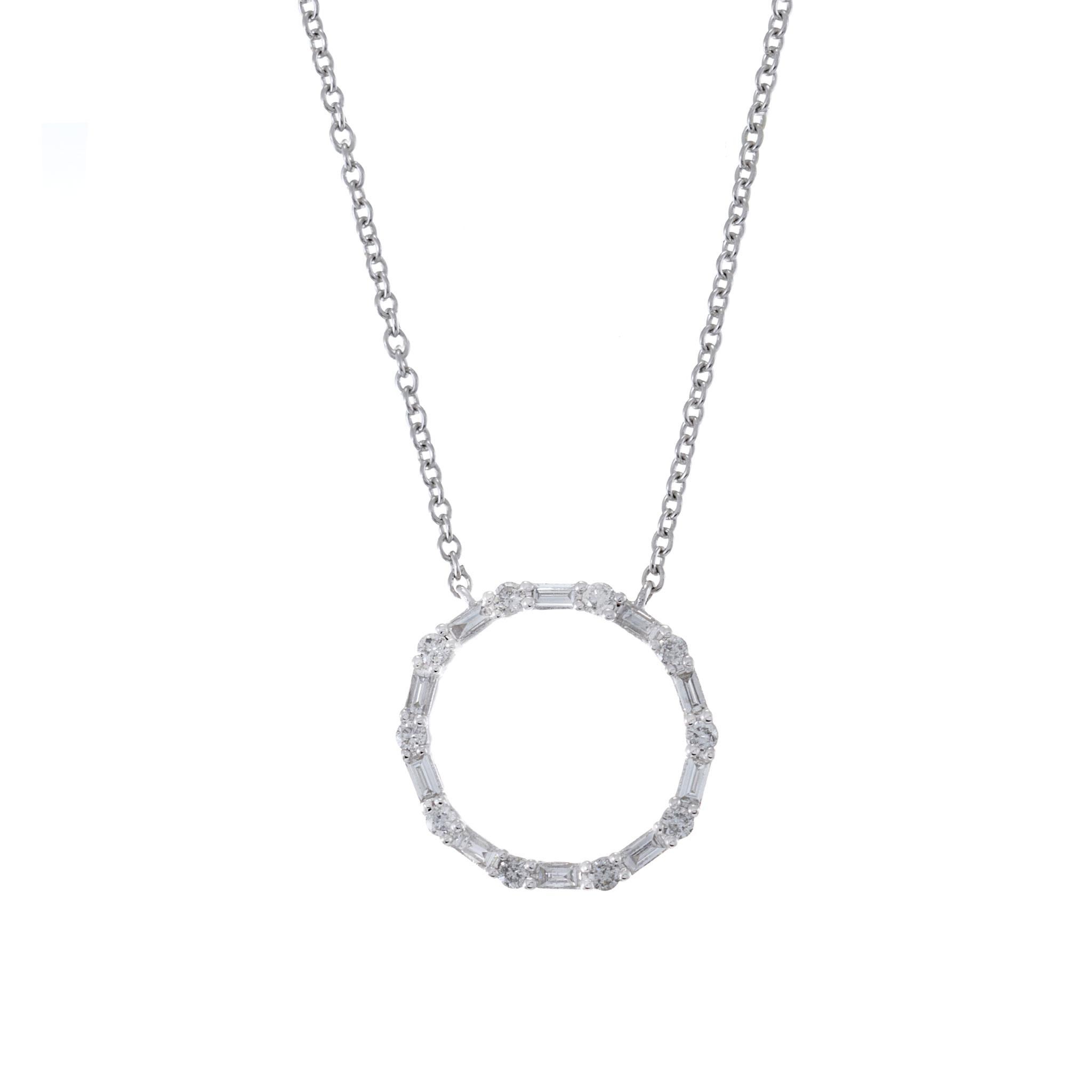 Embrace modern elegance with this 14kt White Gold Circle Diamond Necklace. The pendant, featuring a captivating arrangement of 0.20ct-tw G-H color, SI1-SI2 clarity round and baguette-cut diamonds, is gracefully suspended from a 14kt white gold cable