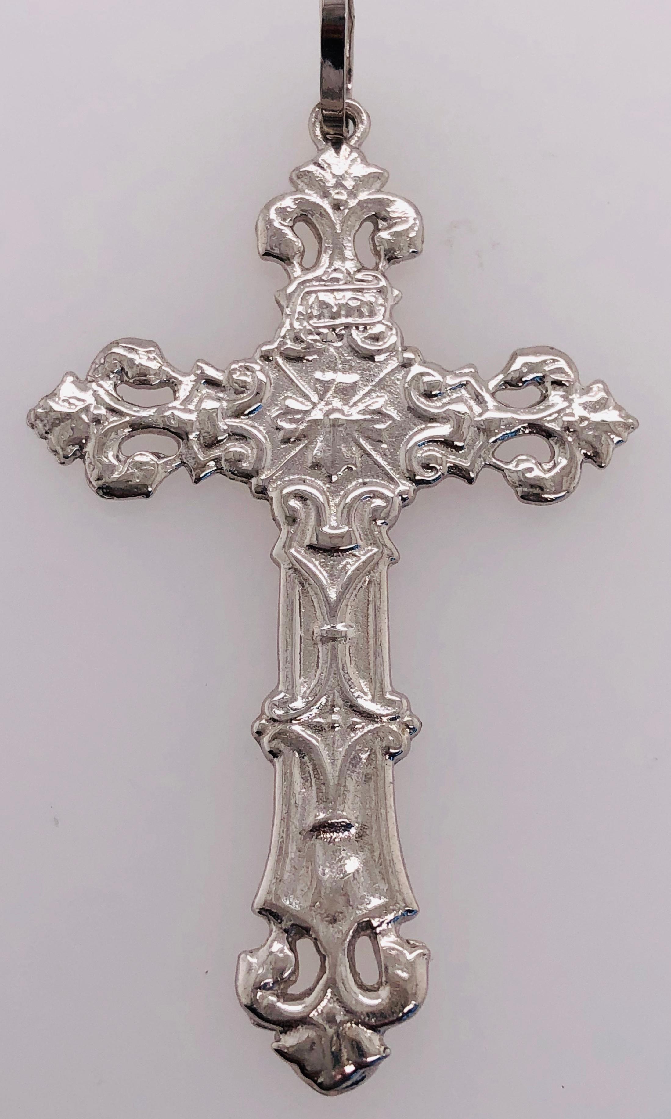 croix en or blanc 14 Kt / Pendentif religieux
6.poids total de 60 grammes