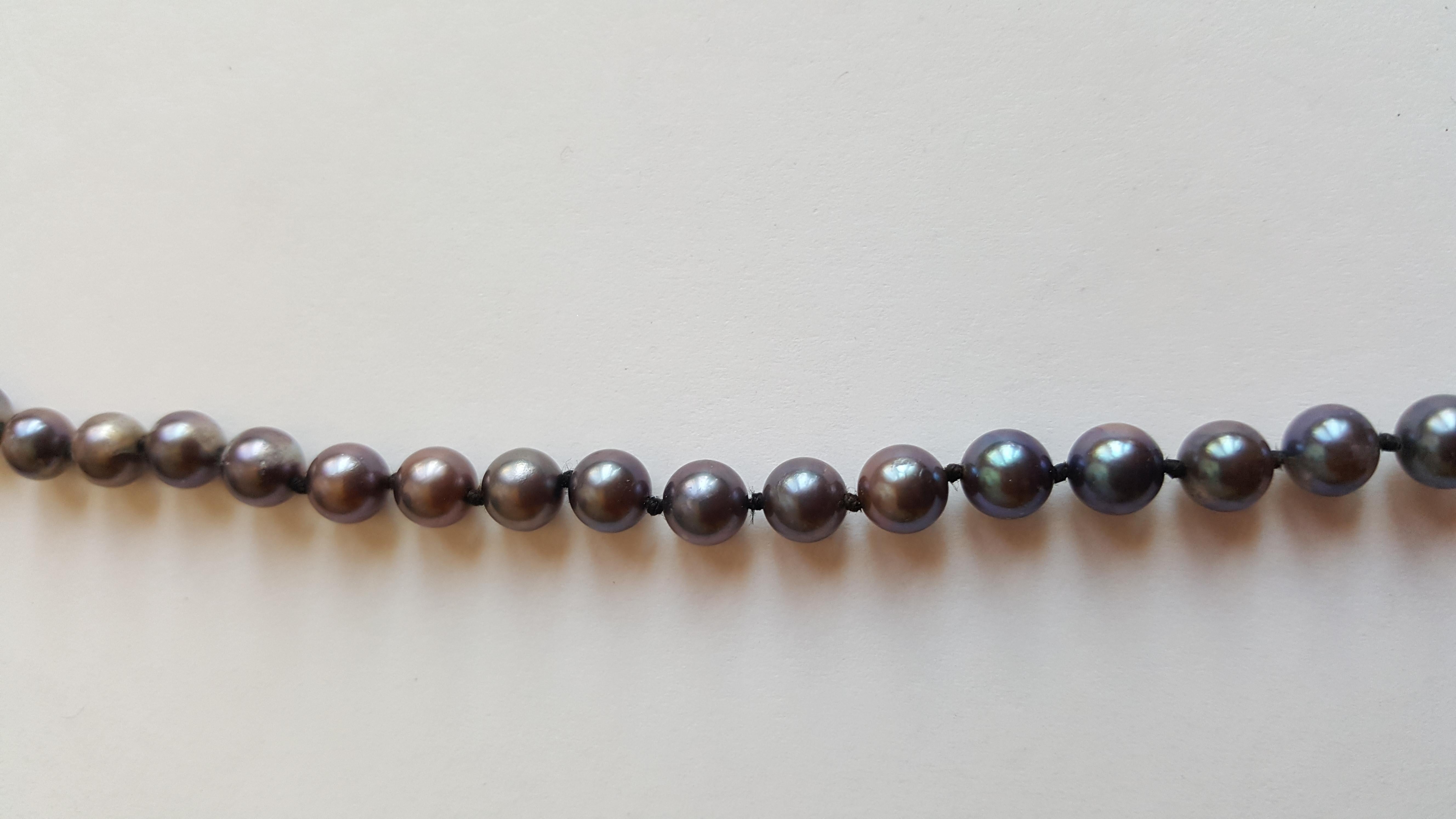 18 inch 5.8mm pearl strand that has cultured pearl that; treated to richen the color to a deep blue silver. Pearl color is vibrant and versatile. The nacre of the pearls is lustrous and clean. Please let us know if you have any questions.

Rock N