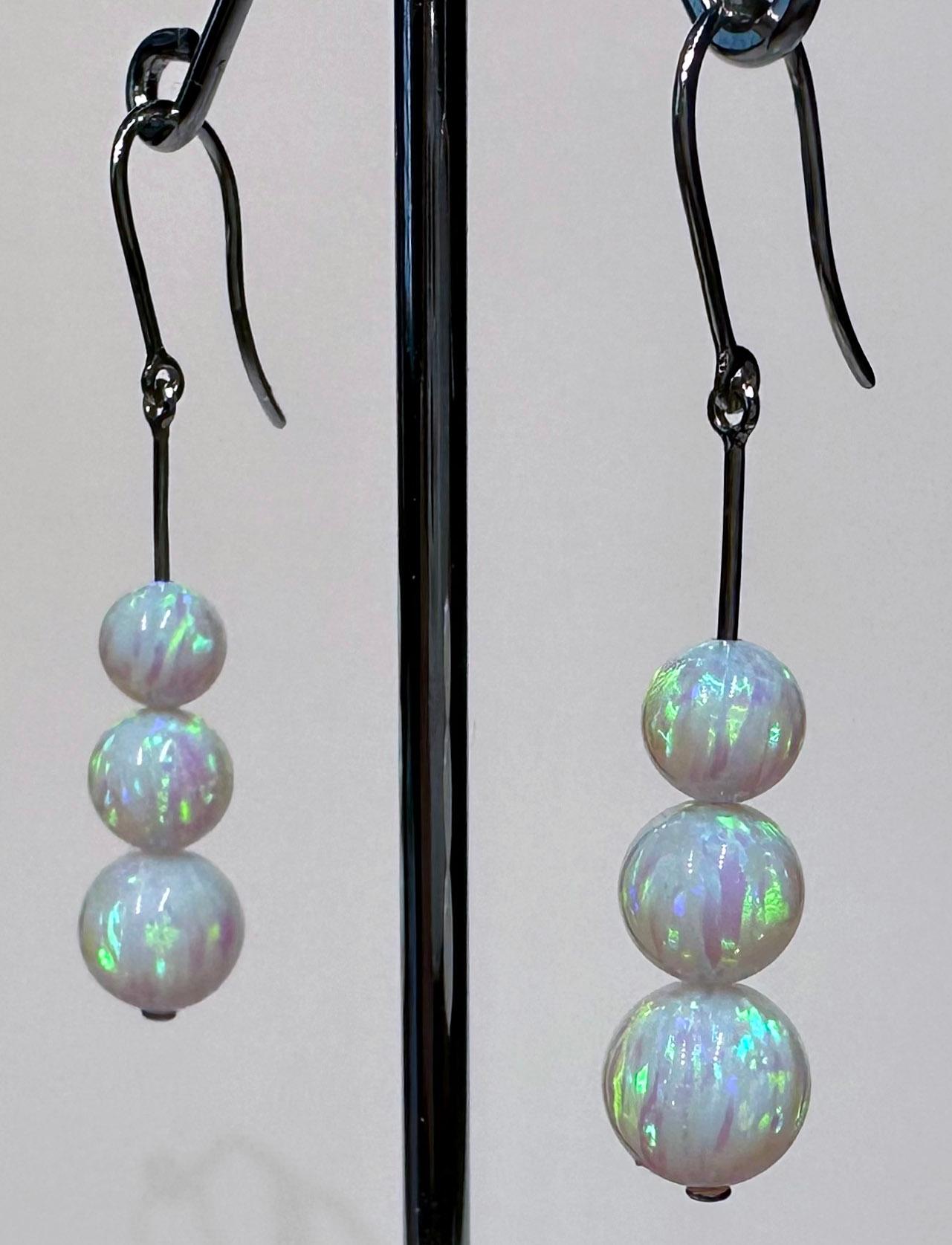 14kt White Gold Dangle Earrings set with cultured Opals For Sale 3