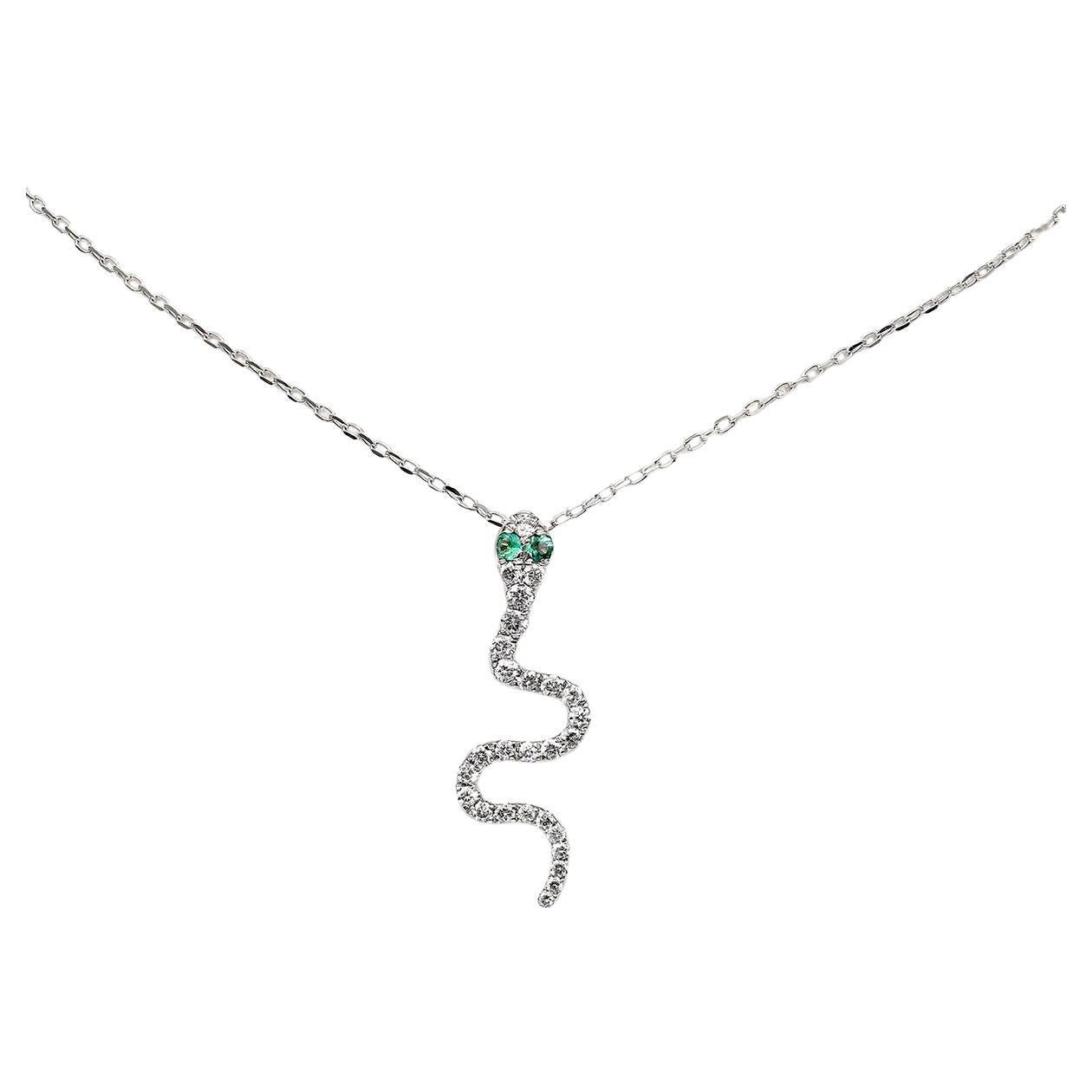 Collier pendentif serpent en or blanc 14KT avec diamants et émeraudes